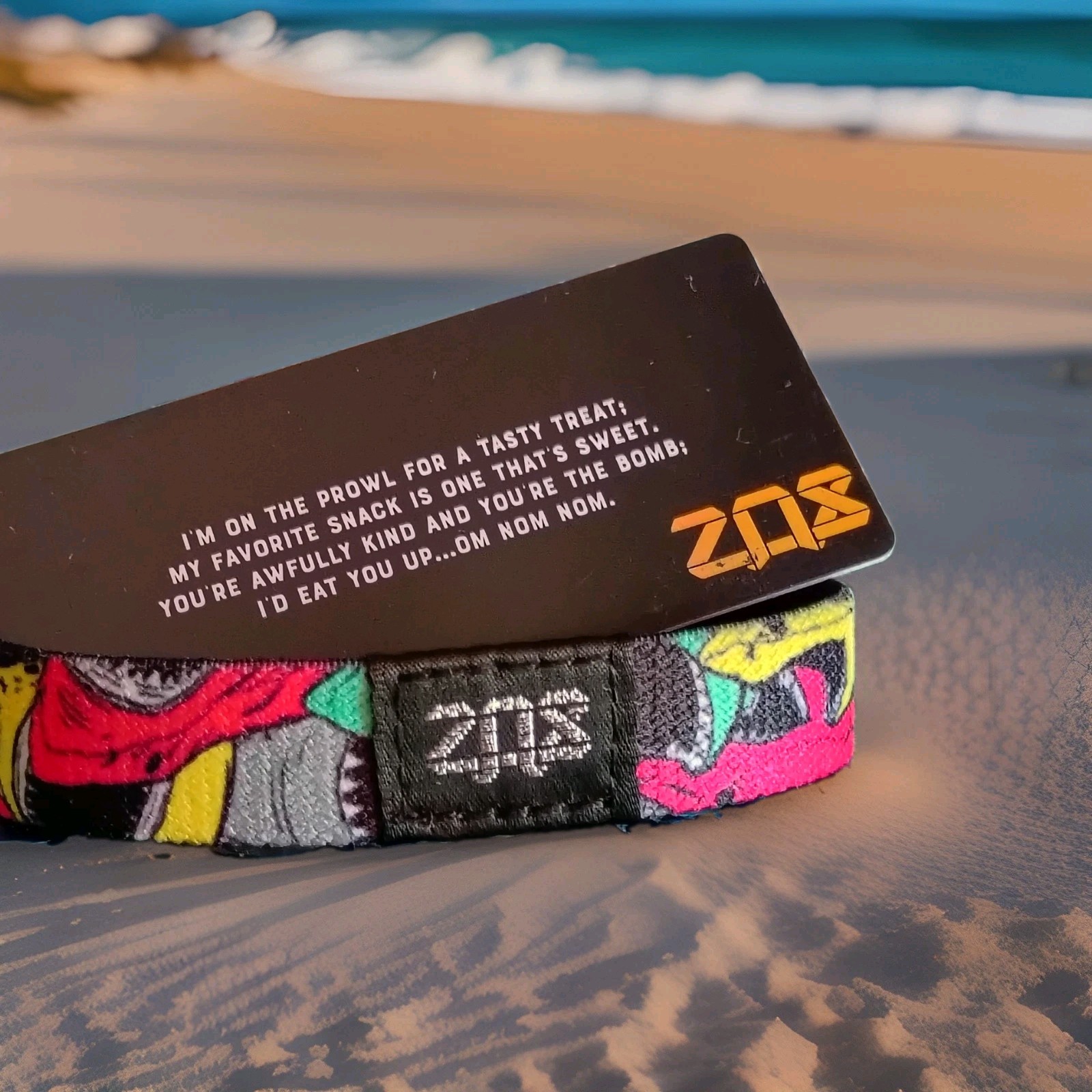 ZOX “I COULD JUST EAT YOU UP” Strap W/ Card. (Size Medium) -Silver