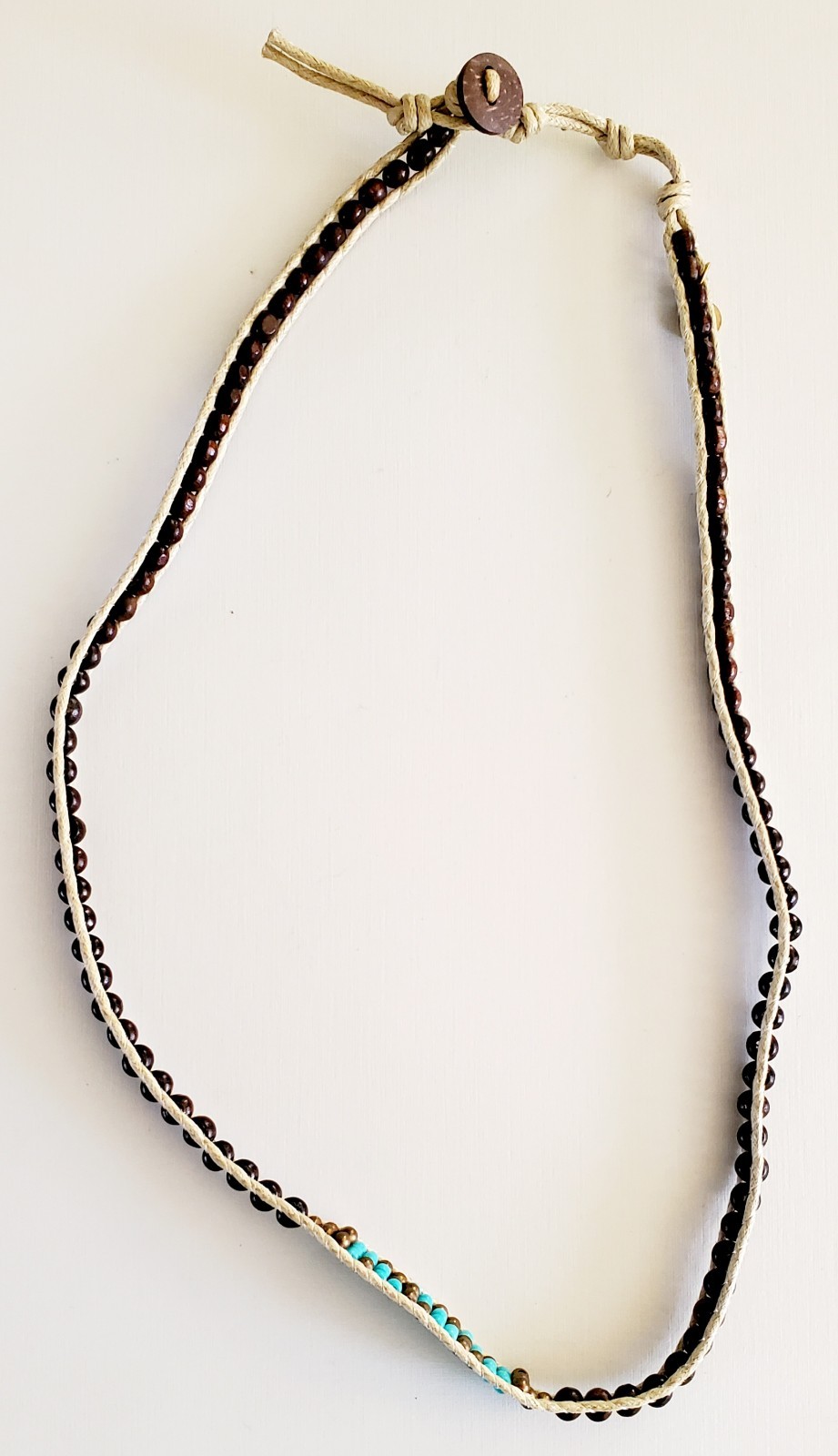 Lotus & Luna 21 inch string & bead necklace. Brown with turquoise accent beads.