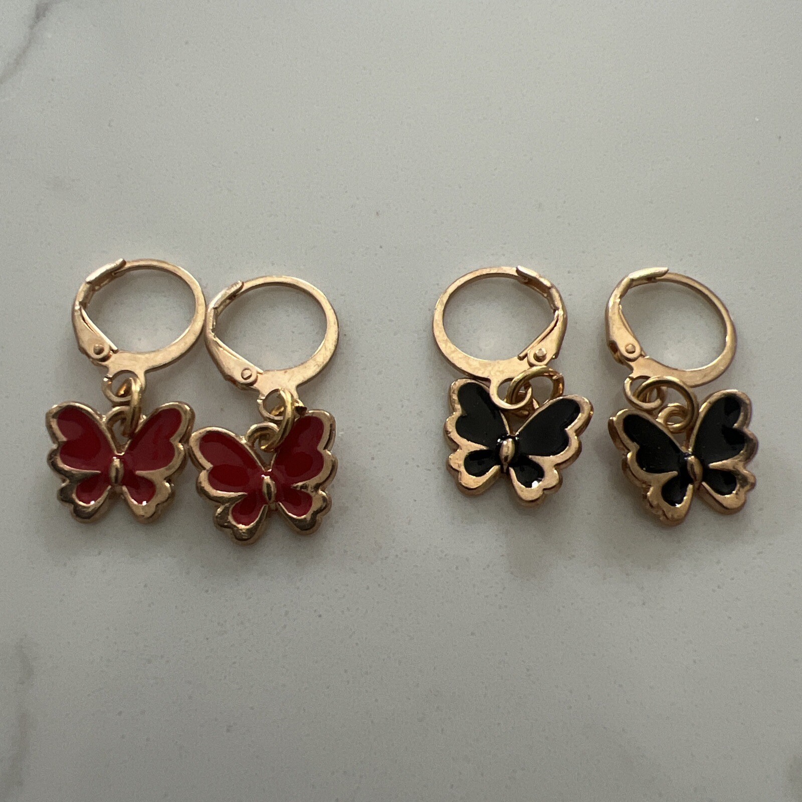 2 Sets Gold Huggie Hoop Earrings 1 Red Set And 1 Black Set Butterflies