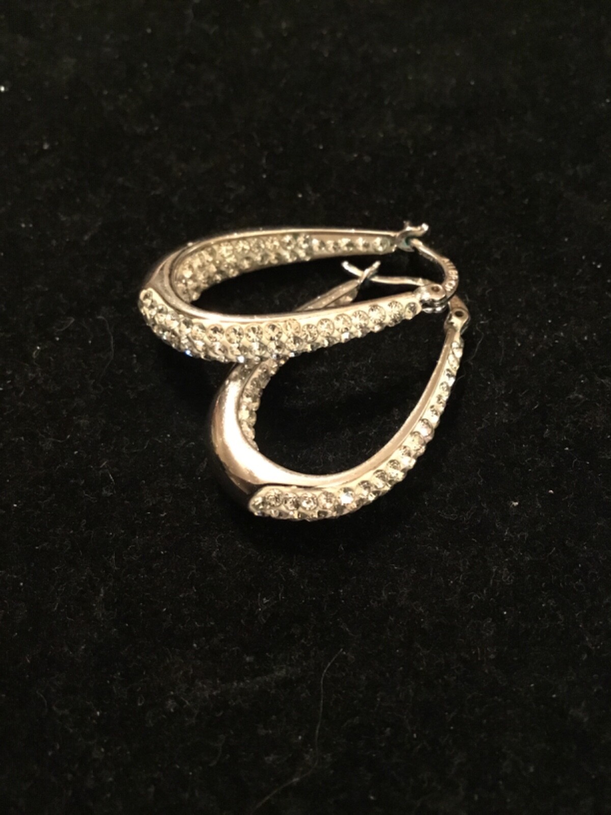 Lovely ATI BR CH Faux Diamond Inside Out Oval Hoop Silver Tone Earrings