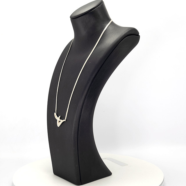 Abstract silver necklace with modern sculptural design