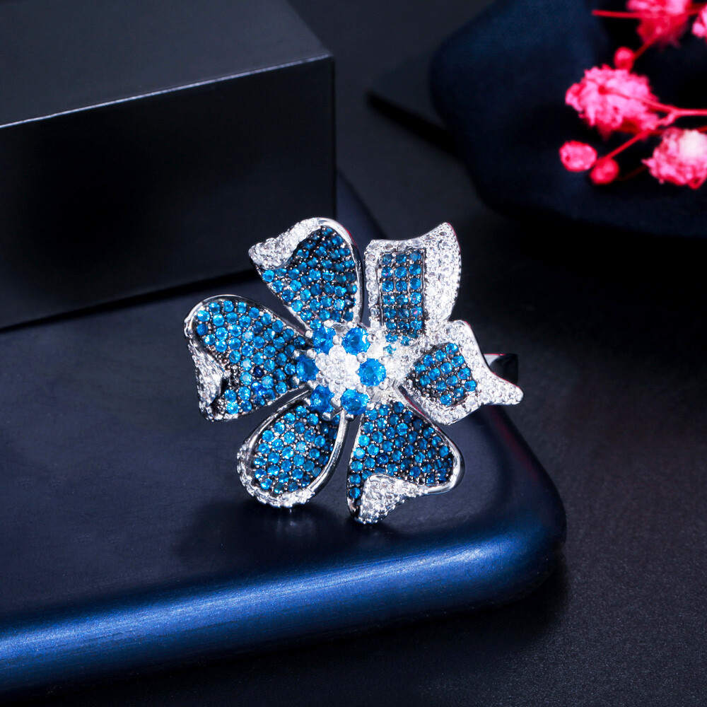 Adjustable 3D Geometric Flower Pave Setting Blue Cubic Zirconia Engagement Ring