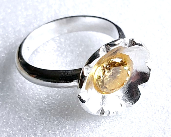 Striking Sterling Silver Flower design 3mm D Shaped band and 8mm CZ Ring.