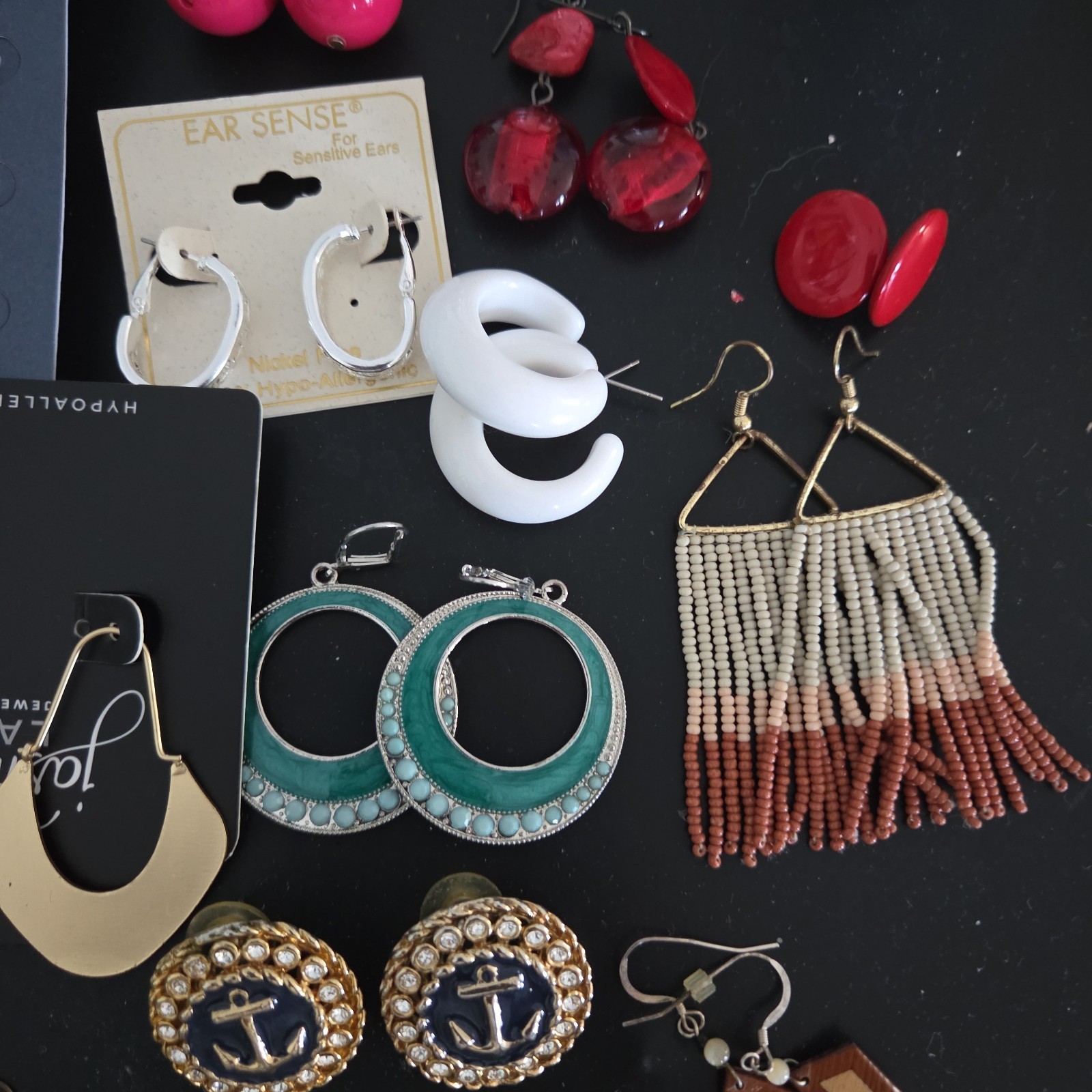 Lot of New & Used Earrings . Mixed colors and models.