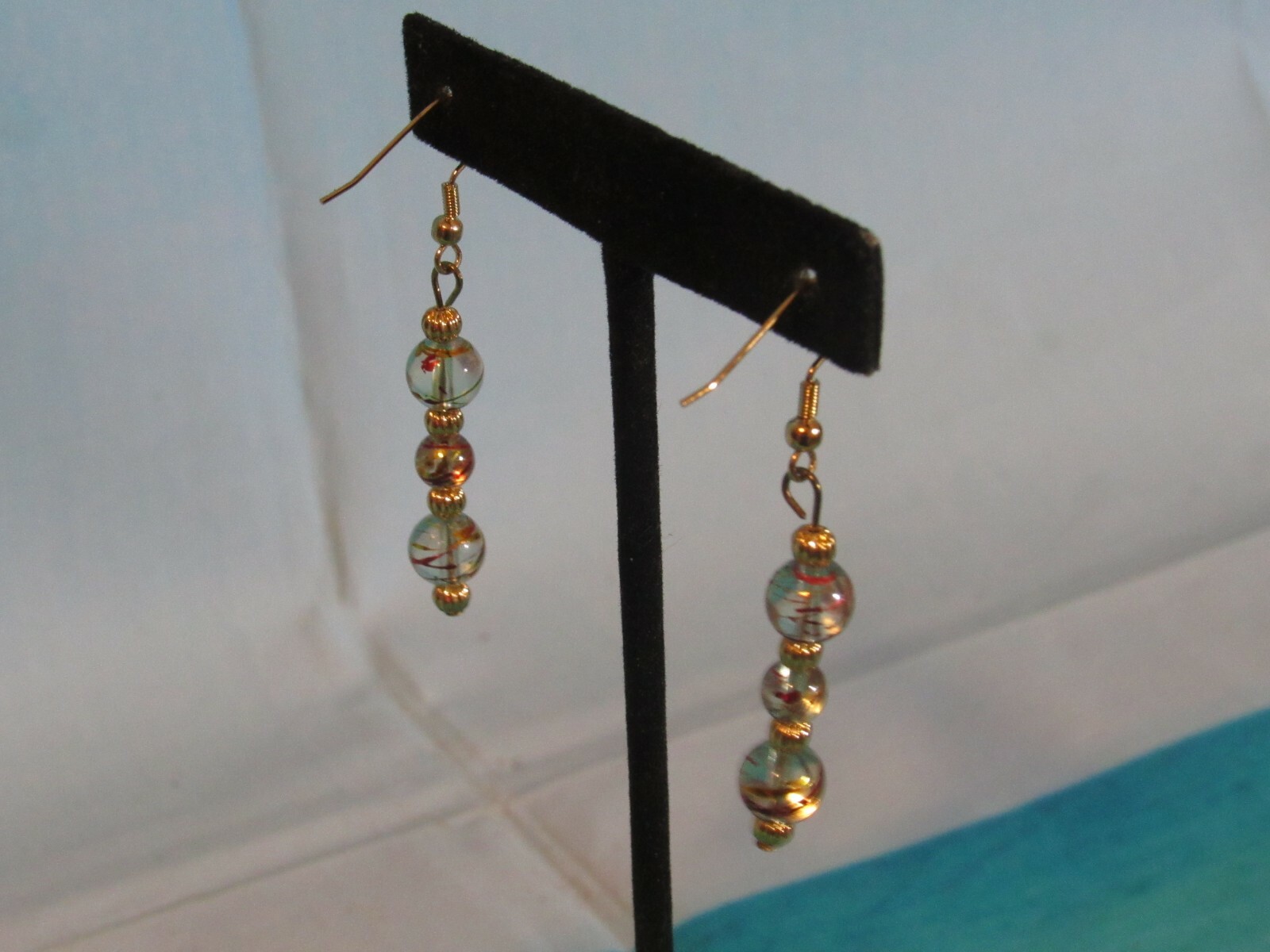 Gold Hook Earrings with Dangling Gold and Clear Beads