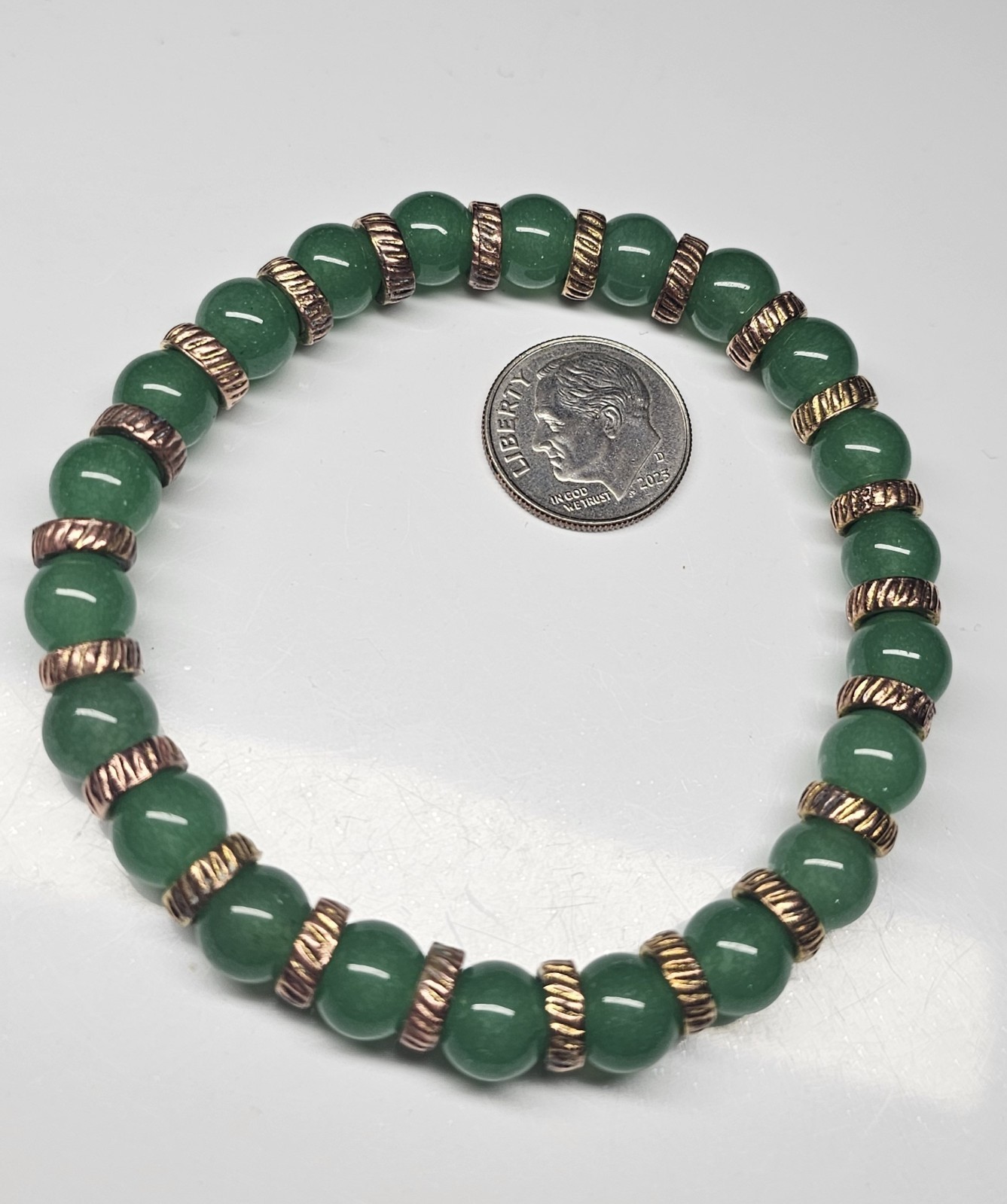 Green Quartz Stretch Bracelet with Copper Spacers 7.5 Inches Beads 7.8 mm.