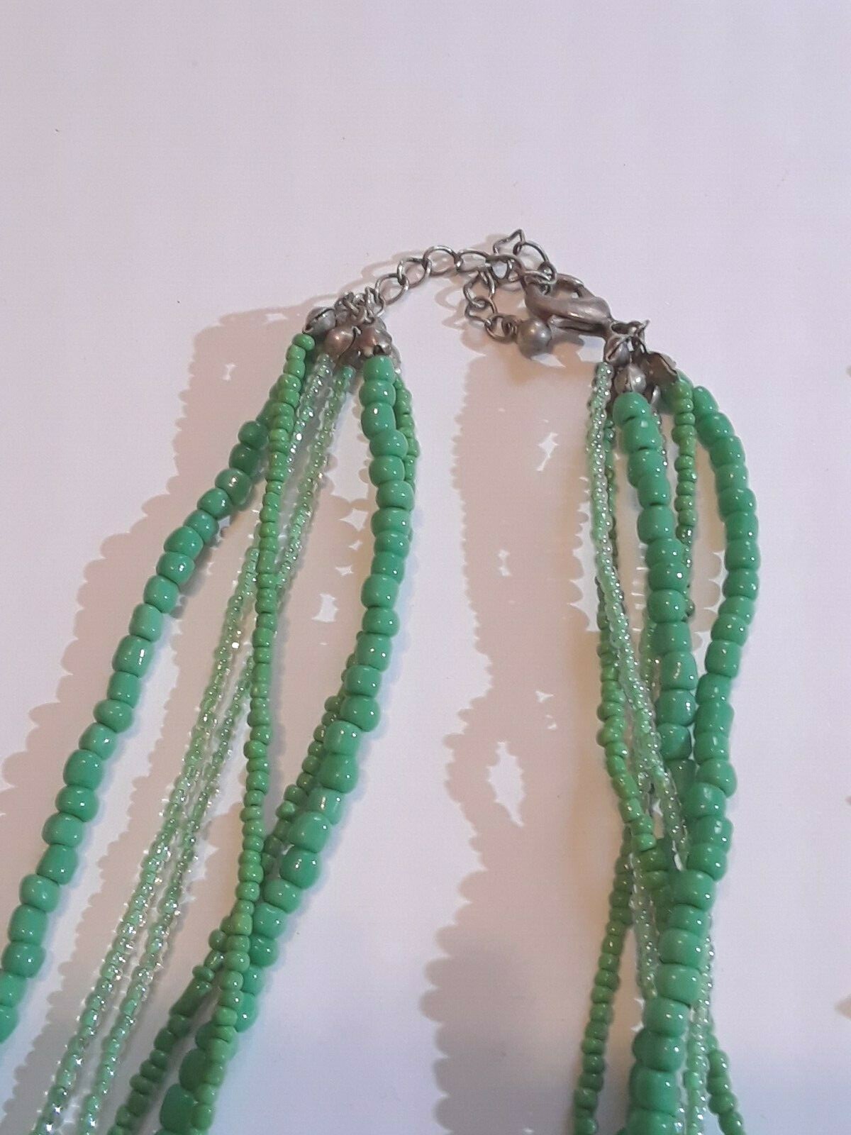 Green beaded necklaces. multi-strand. gemstone. glass, plastic. Beautiful!
