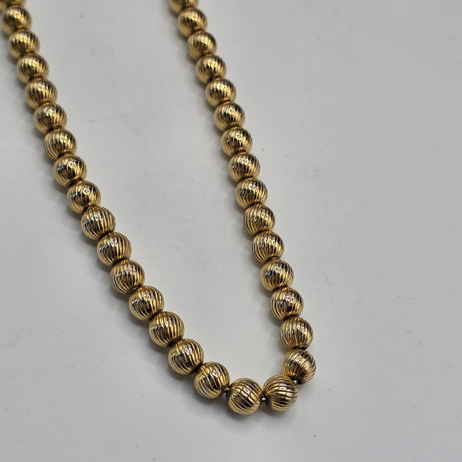 Monet Vintage Gold Tone Ribbed Bead Necklace Textured Round Strand 27 Inch