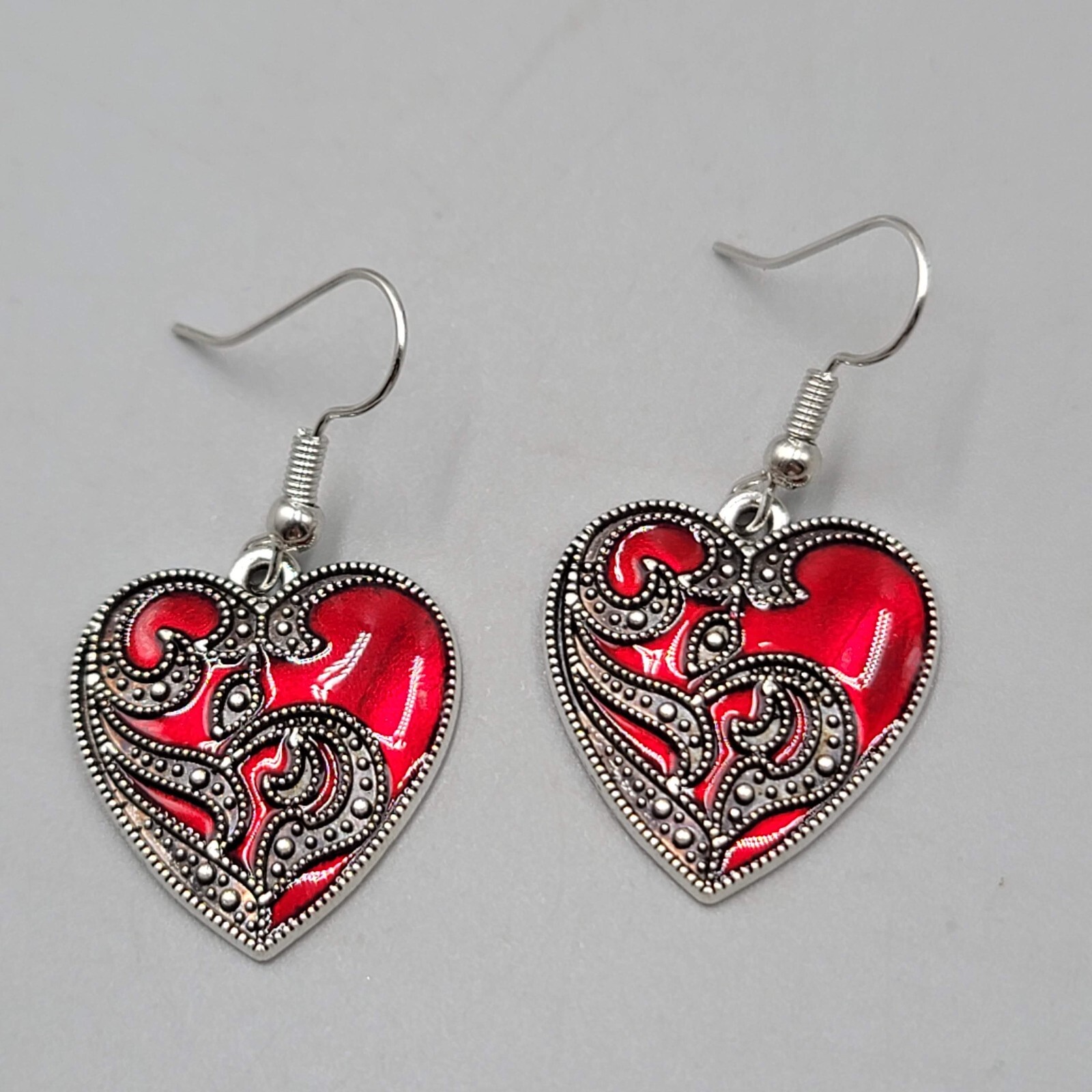 Satin Enamel Heart Pierced Earrings Black Swirl Accent Silver tone Dangle 1″