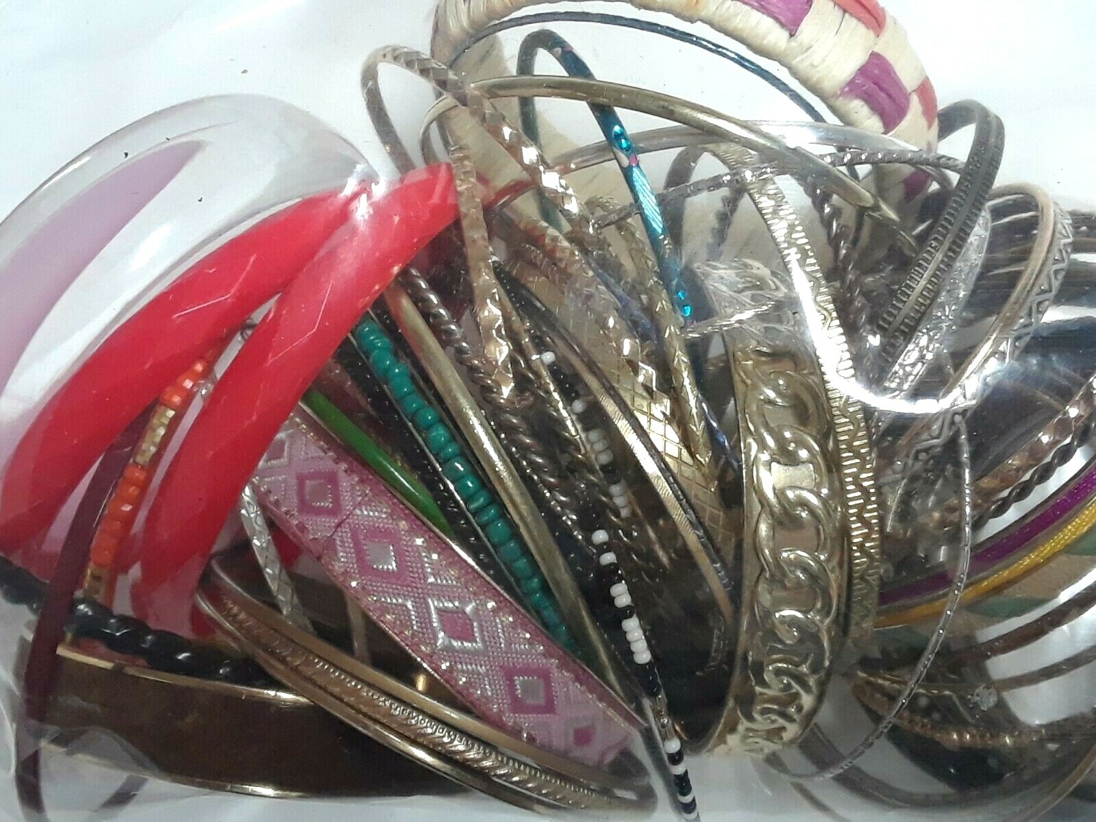 Bangle bracelets. gold tone silver tone, metal, plastic, with patterns. Lot