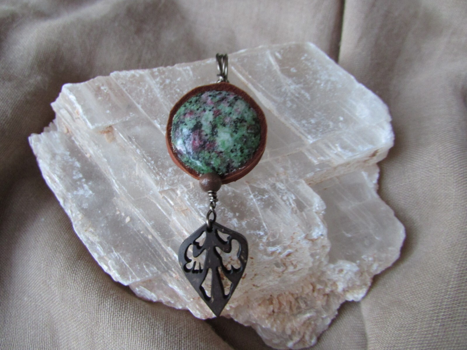 Ruby Zoisite and wood Pendant. Wire wrapped with Leather trim, 