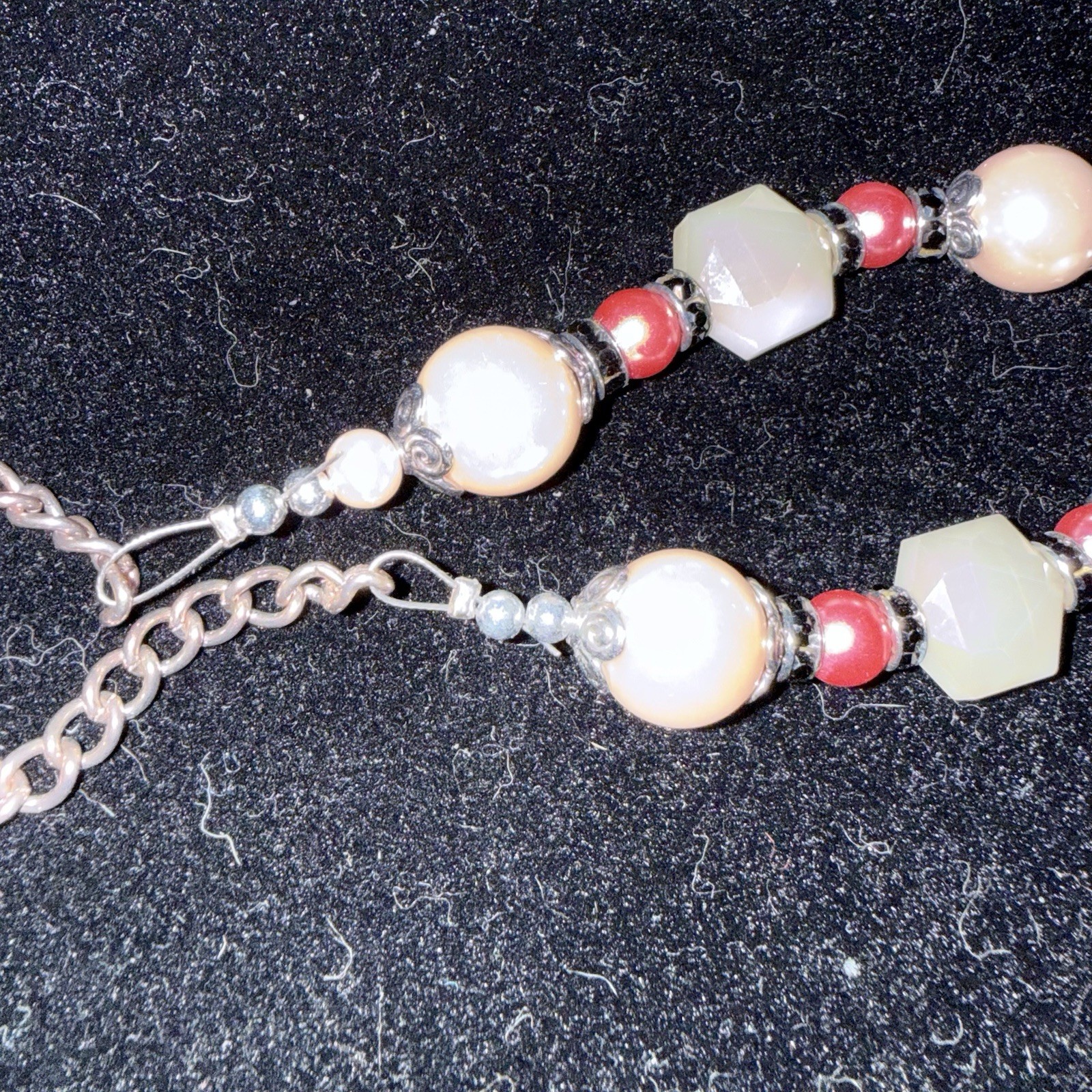 Silver tone red & white beaded necklace w/ orange rectangle charm, adjustable