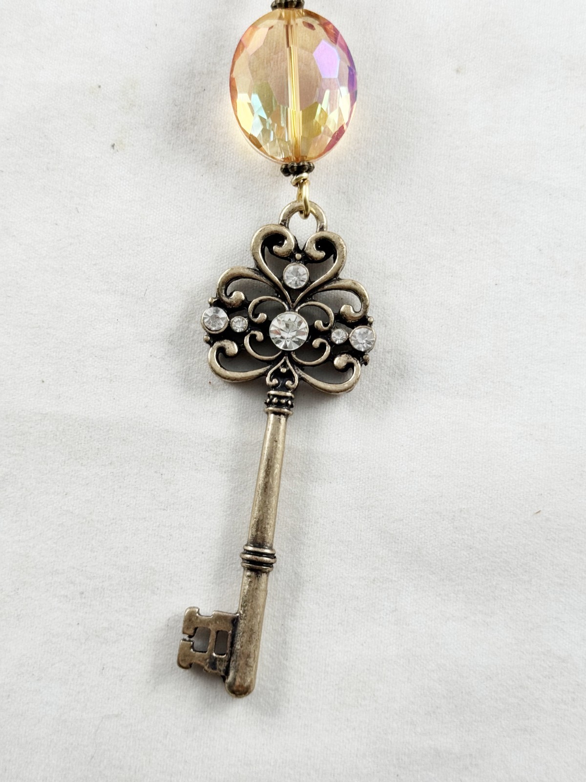 Antique bronze color chain necklace with Amber crystal and ornate key