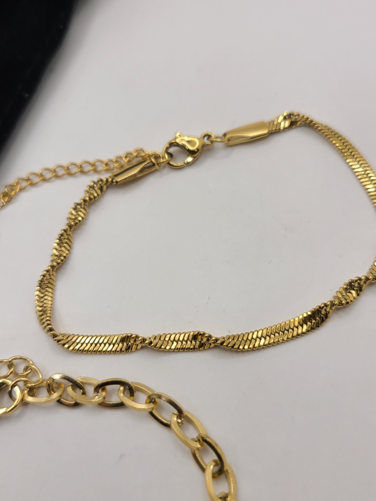 SLIDE Set Of 2 Gold-tone Clover & Twisted Herringbone Bracelets