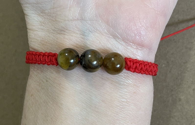 Pulsera Roja Ojo de Tigre para la proteccion general de la vida. Año Del Tigre