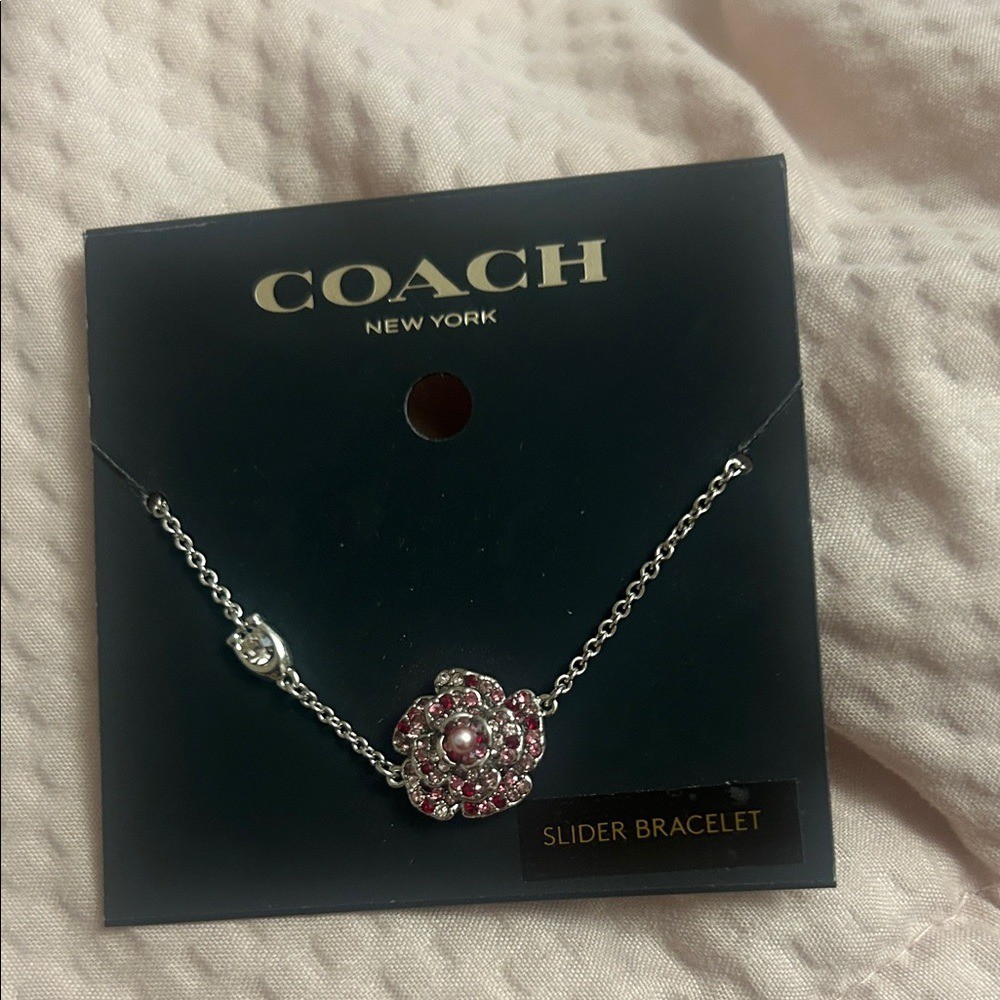 NWT Coach Silver Bracelet with Pink Flower Accent