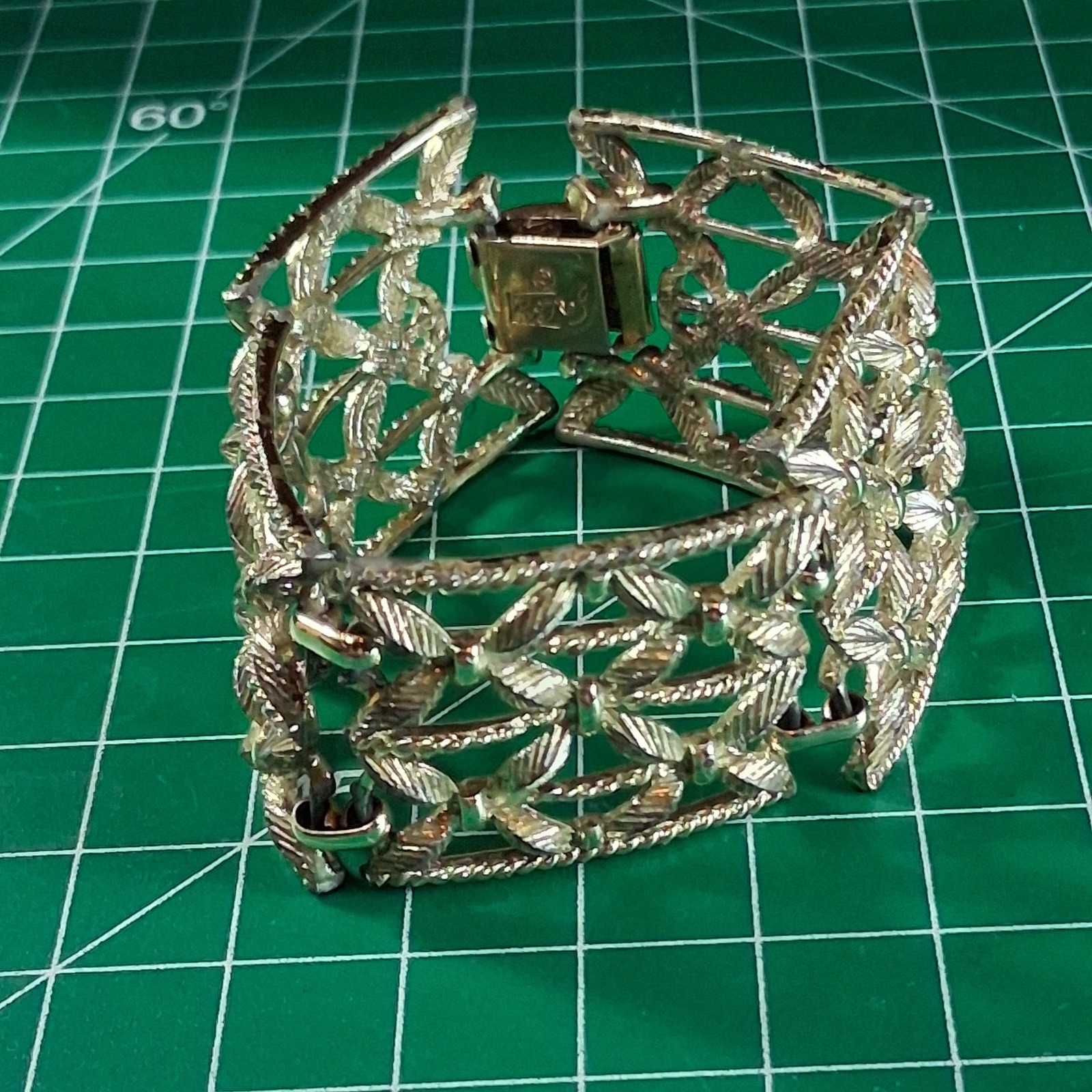 Vintage Cora Silver Tone Wide Band Floral Design Fold Over Clasp Bracelet