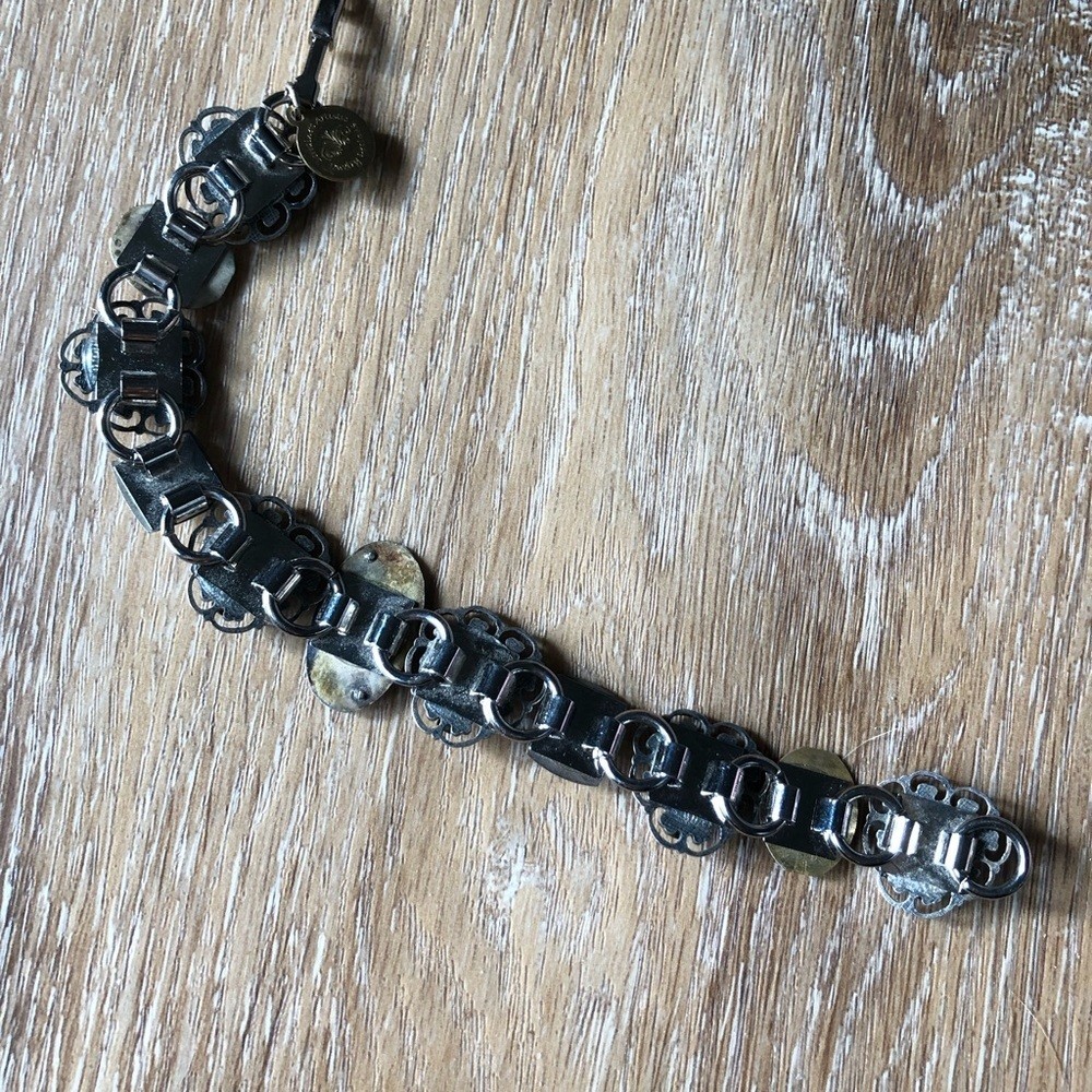 Artistic Silver and Gold Watch Face and Cross Bracelet