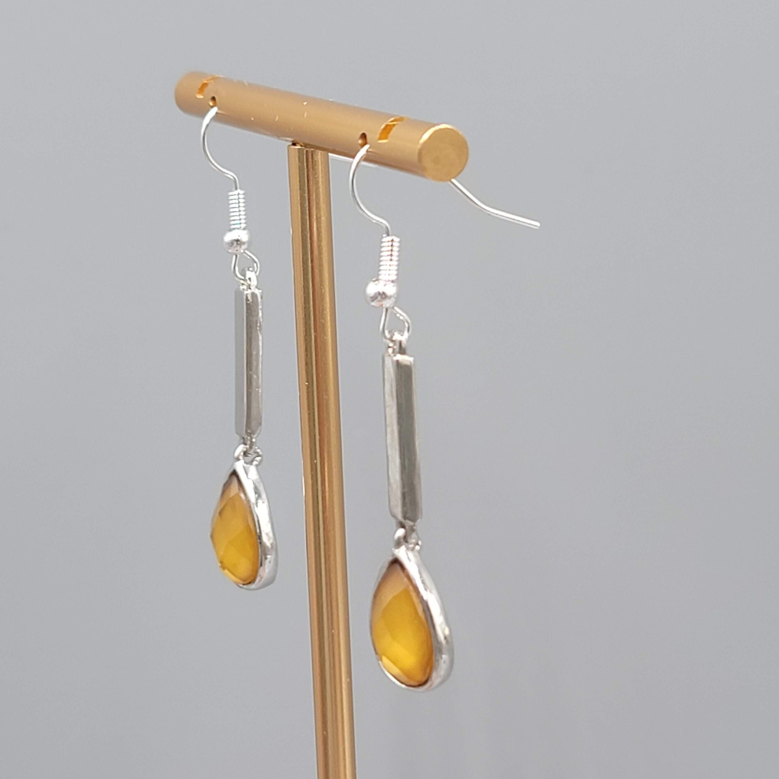 Faceted Yellow Teardrop Pierced Earrings Silver tone Dangle 2 3/8 in