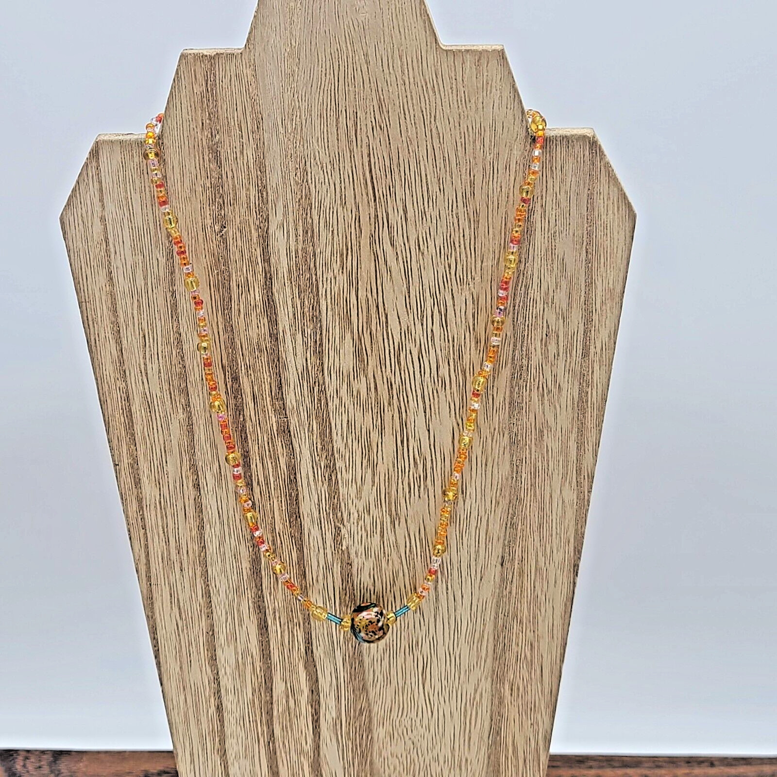 Orange, Yellow & Clear Seed Bead Necklace w Multi-Color Swirled Glass Pendant