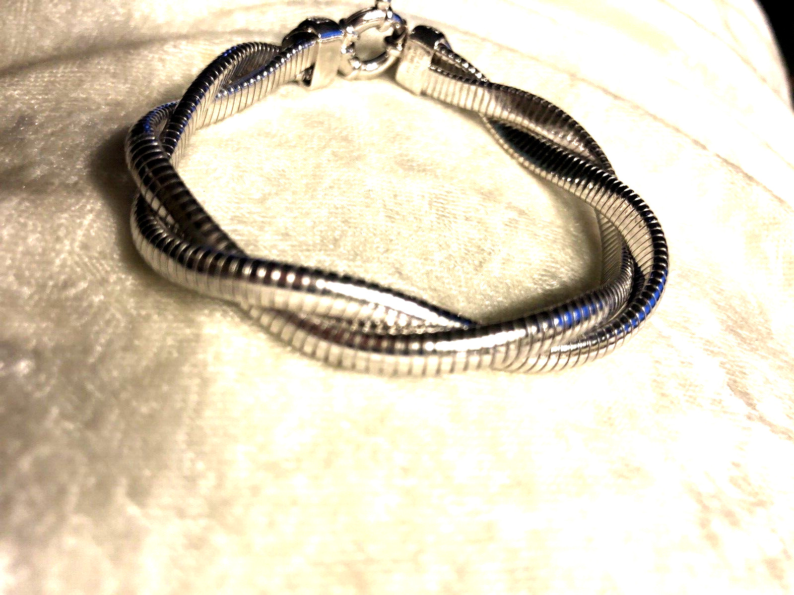 DIAMONIQUE CZ ITALIA TUBOGAS TWISTED SS BRACELET, SIZE SM/MED (M4616-42)