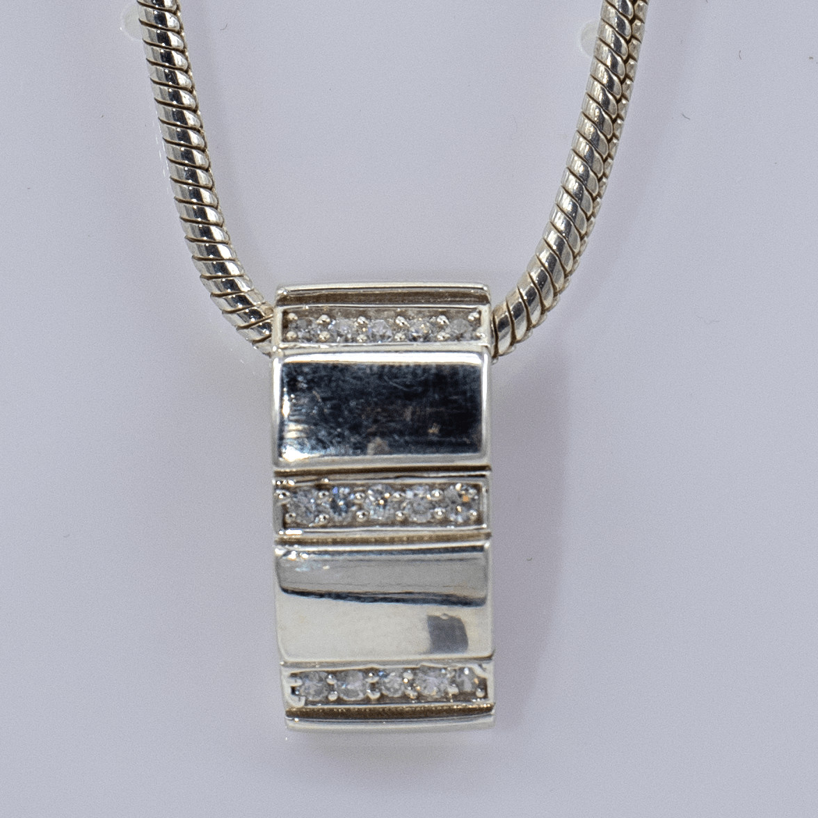 Silver snake necklace with sparkling cubic zirconia