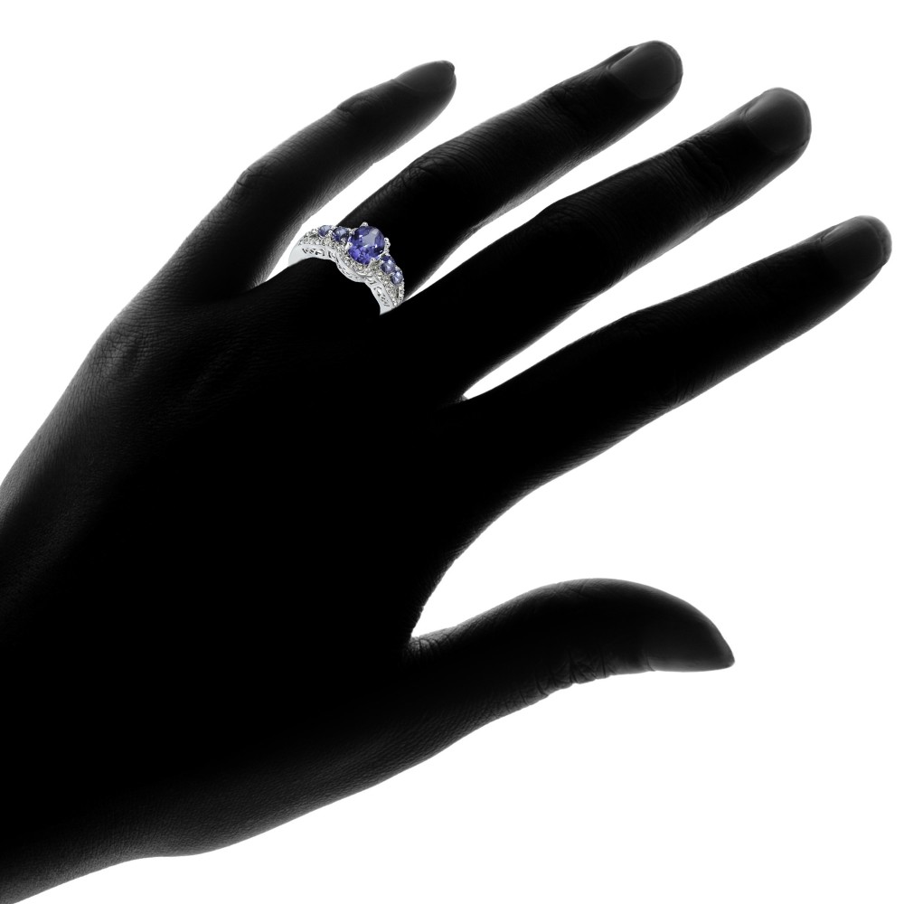 Simulated Tanzanite and Cubic Zirconia Oval Halo Five Stone Ring