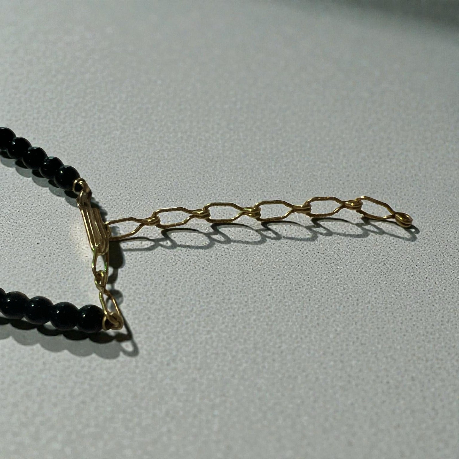 Vintage 1928 Jewelry Co with Black Beads and Gold-tone Pendant w/Pink Rose