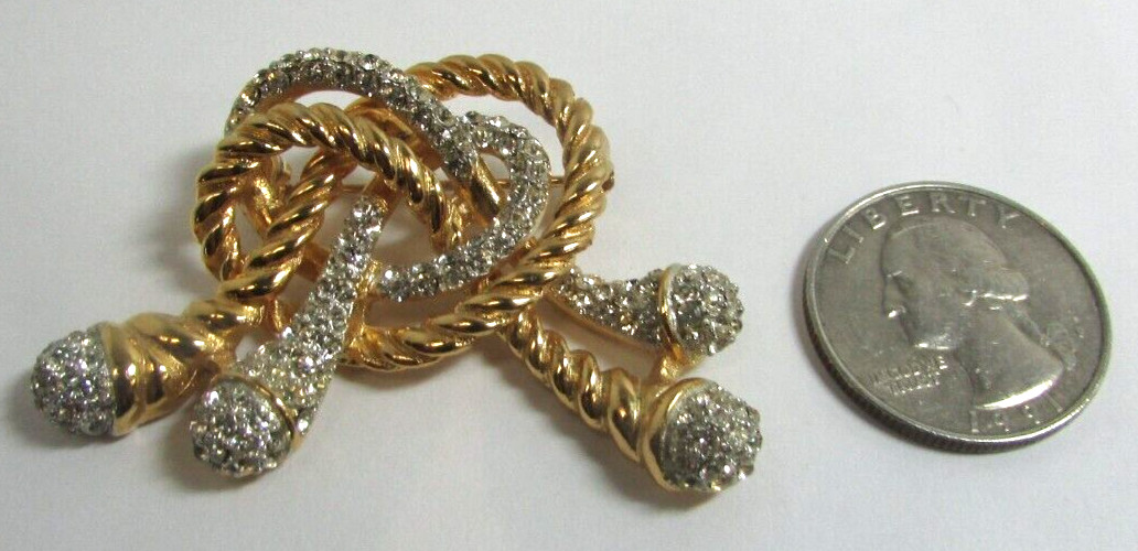 KJL KENNETH JAY LANE Pave’ Crystal Embellished Knot Gold Tone Pin Brooch