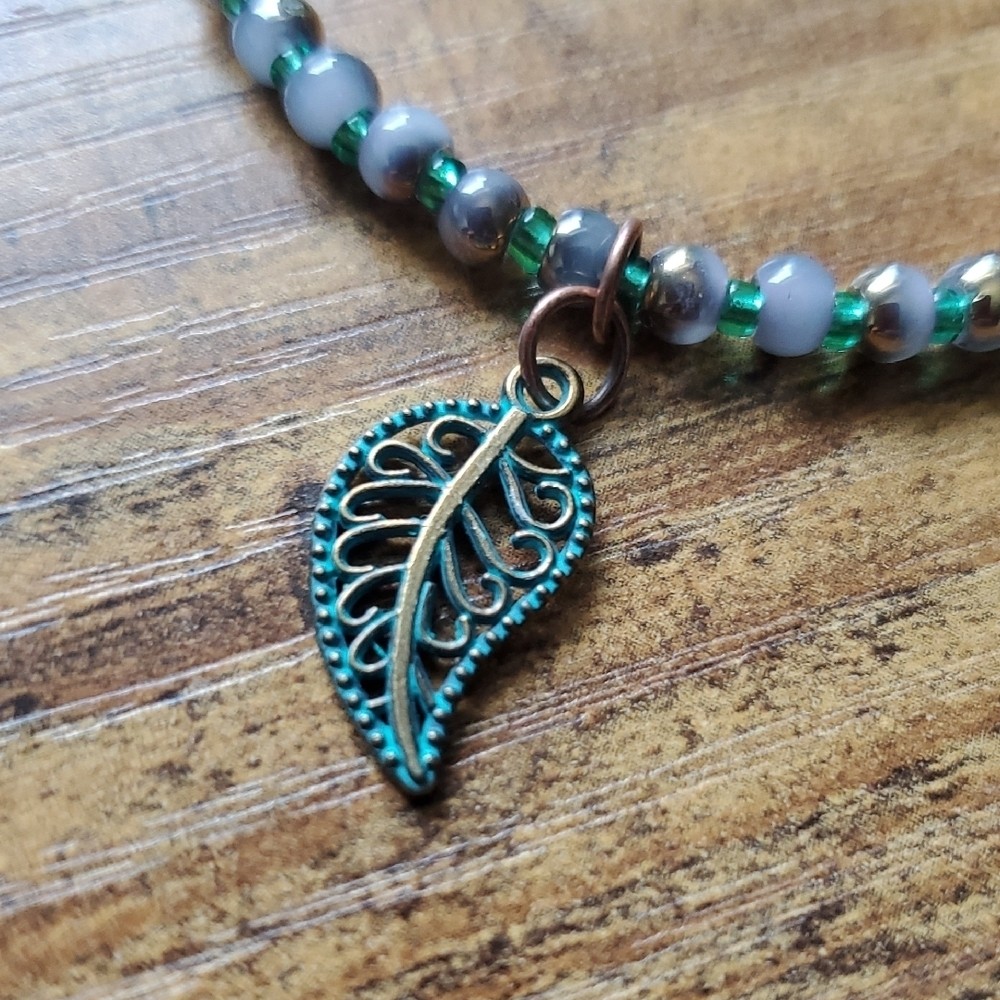 Chic Beaded Bracelet with Leaf Charm