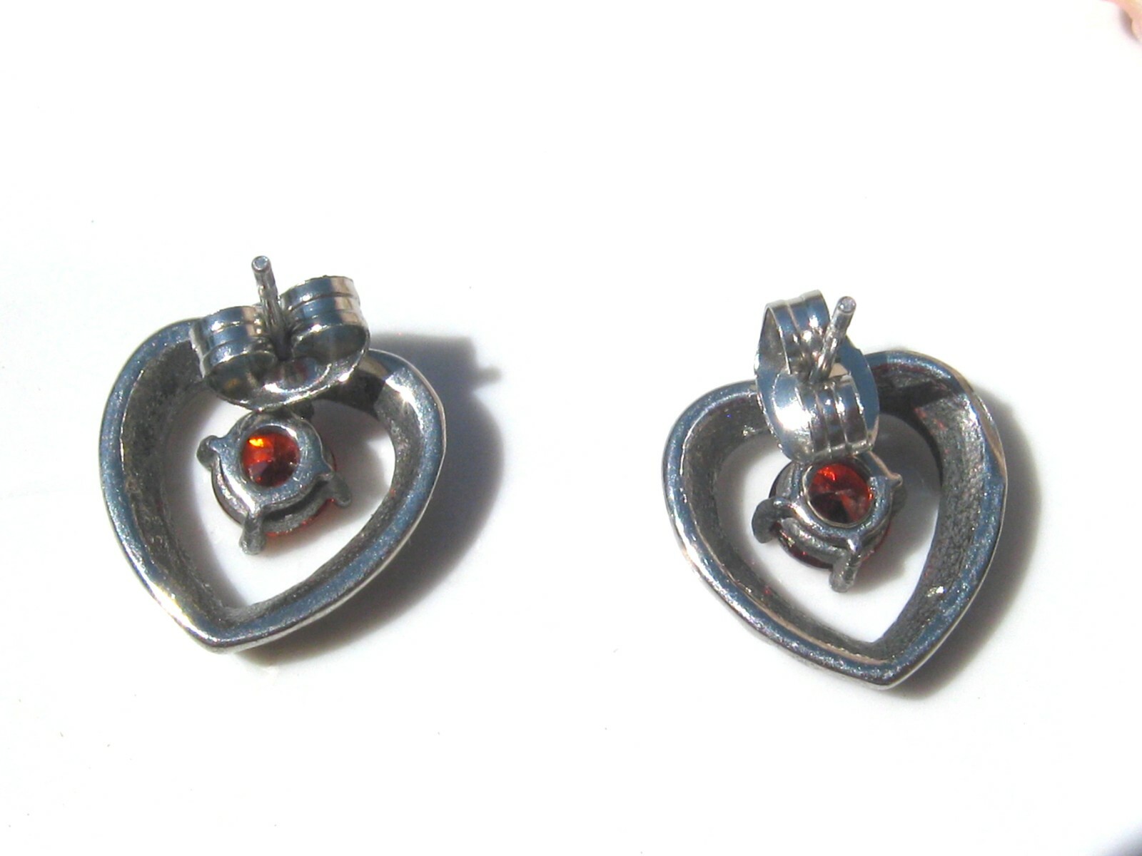 316L Surgical Steel Hollow Heart Earring With Red CZ Center Stone