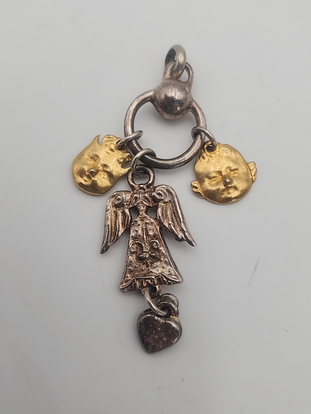 silver and gold tone Tina LaHaye Angel pendant