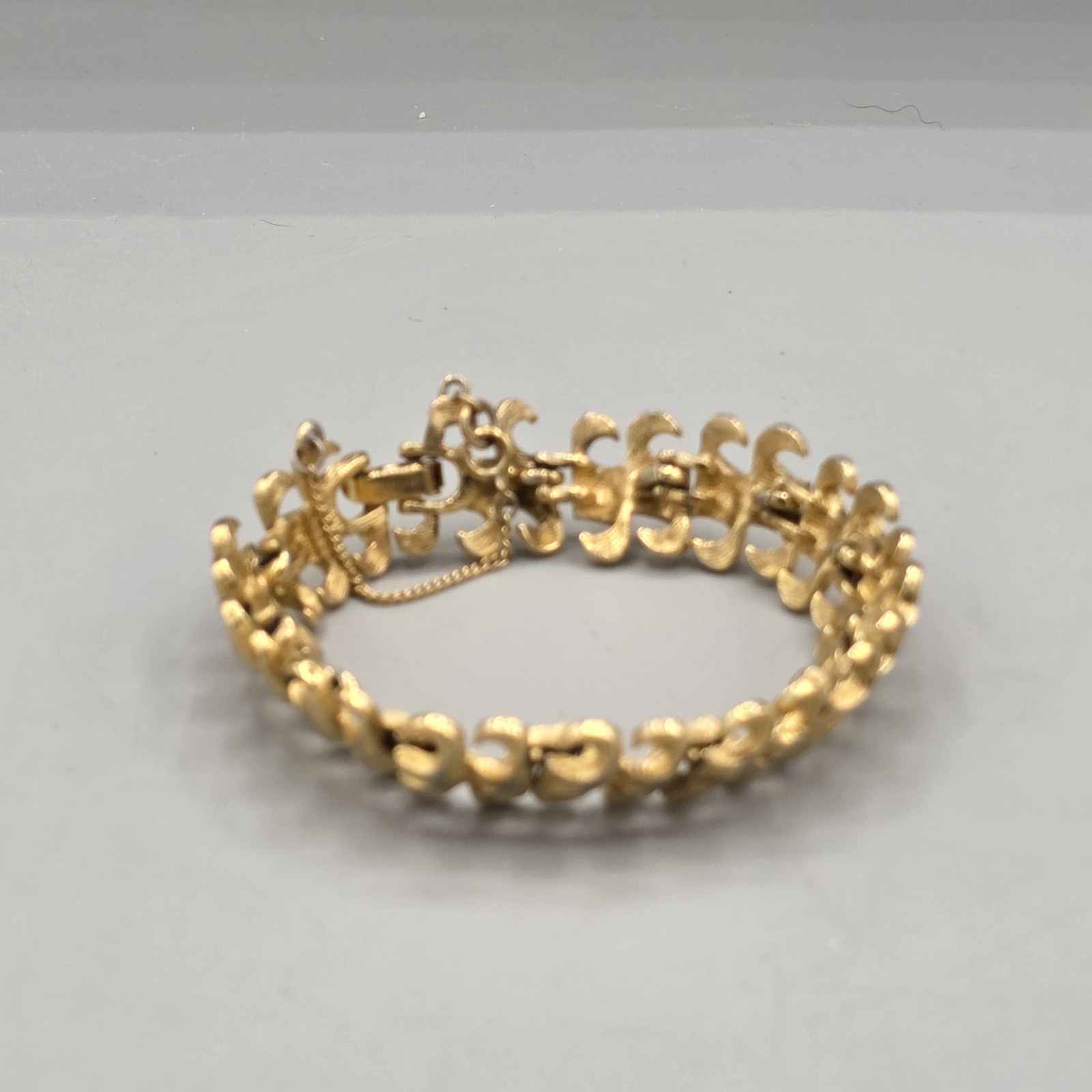 Vintage Monet Gold Tone Textured Link Panel Bracelet Fold Over Clasp