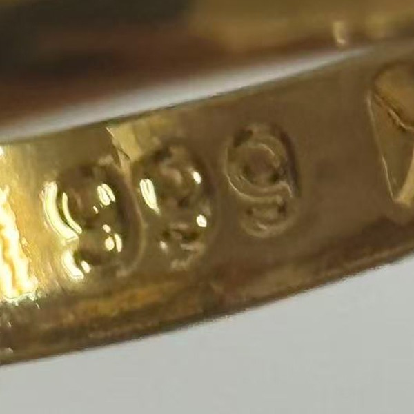 Simple Band Ring Gold-plated (NOT SURE) marked ‘ 999 ‘, Size 9 adjustable