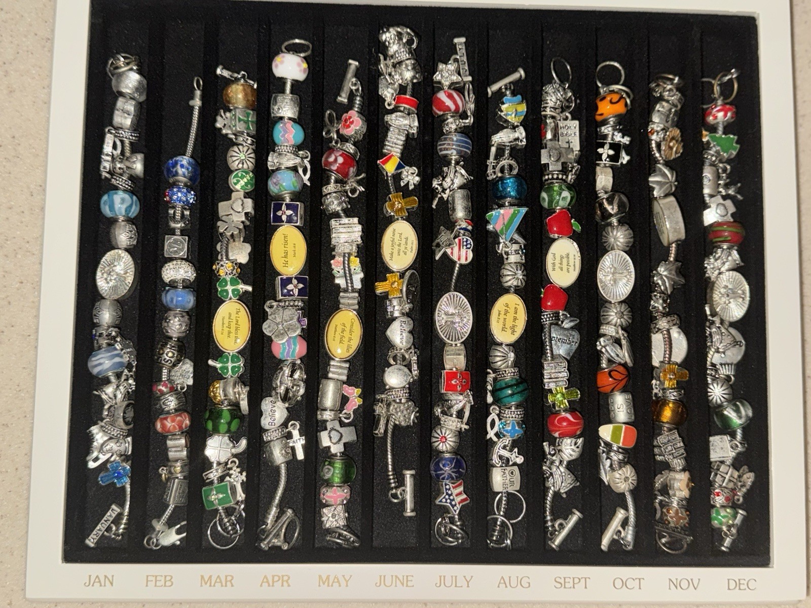 Willabee and Ward 12-Month Charm bracelets inscribed Christian scripture