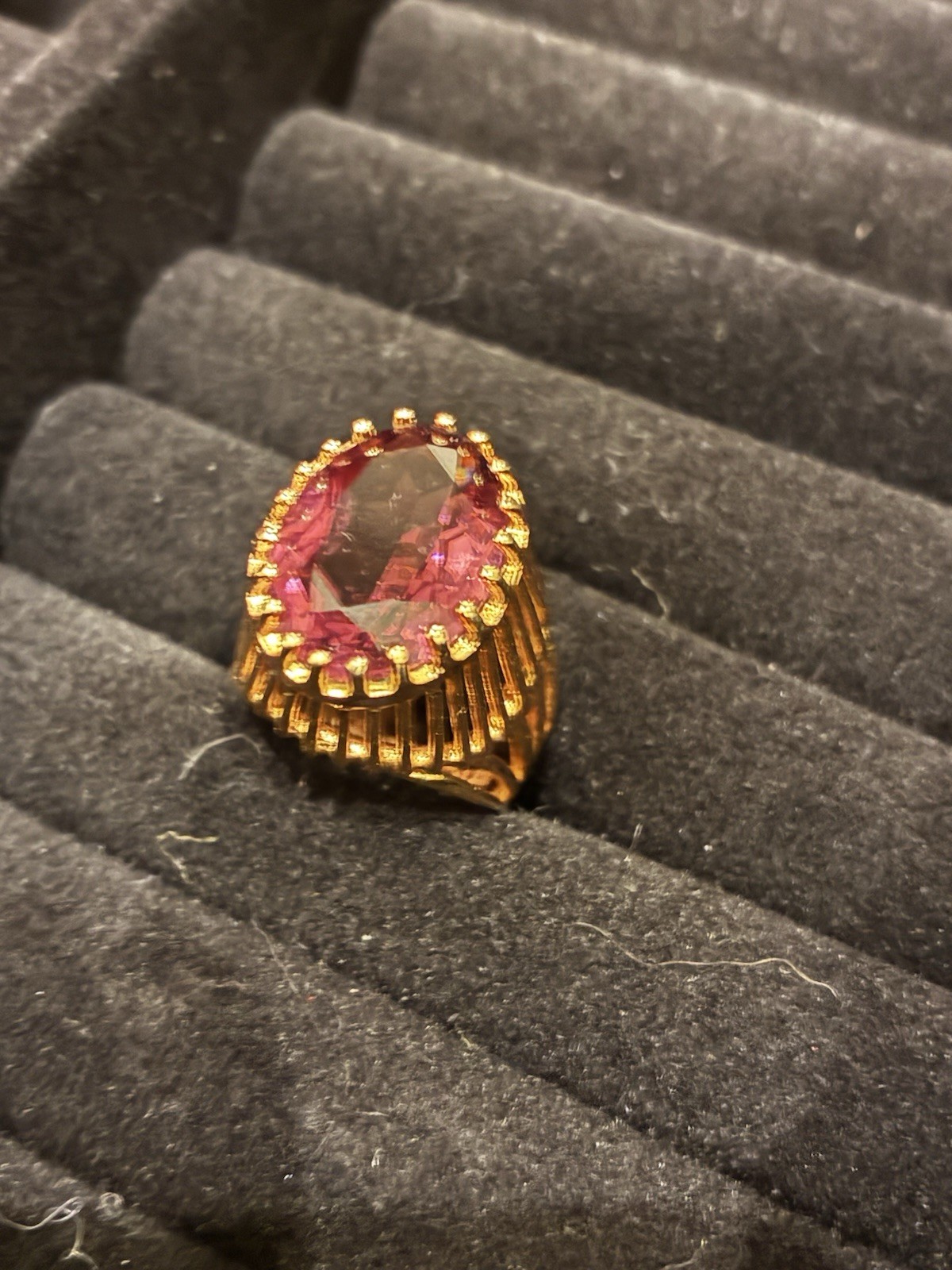 yellow gold cocktail ring, large red purple stone in prong setting 7.5-8.0
