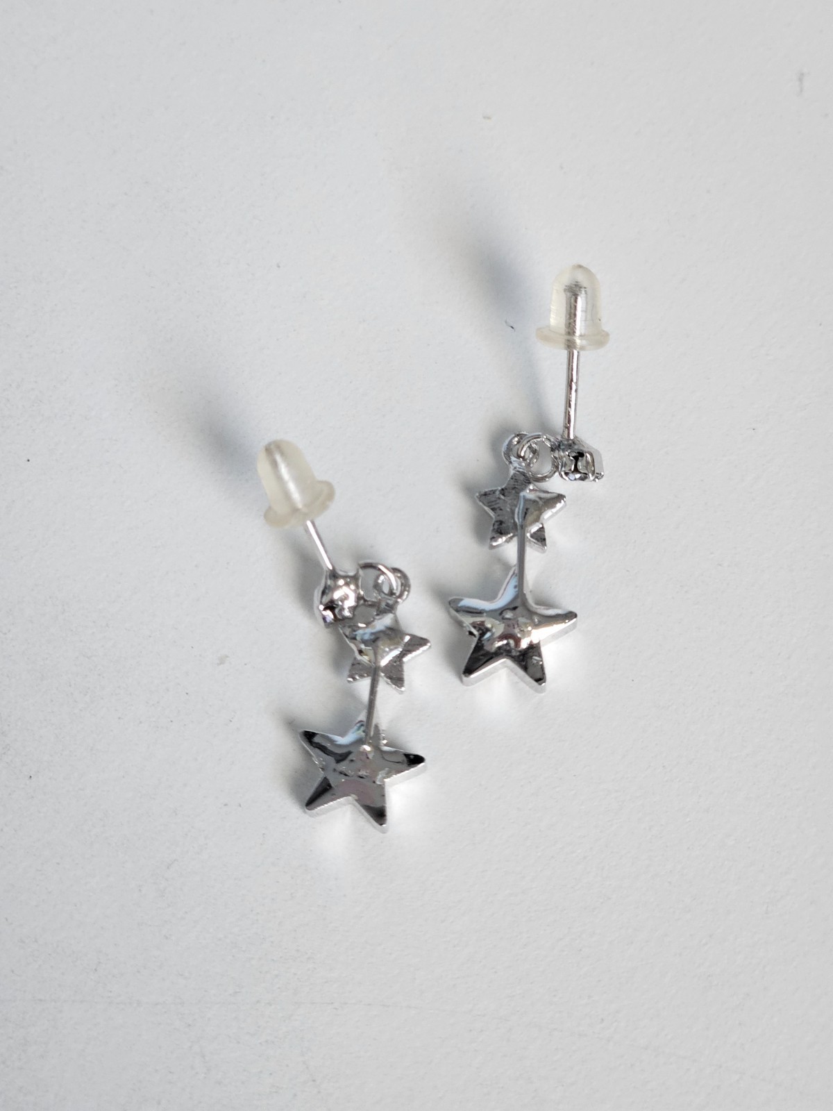 Silver-tone dangle stars earrings