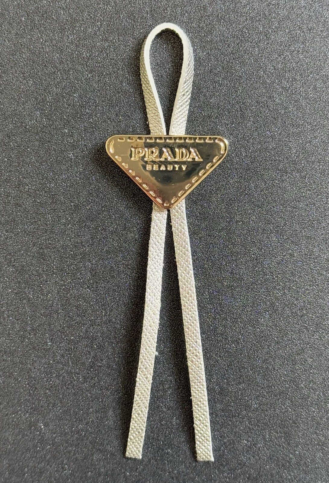 Prada Beauty Gold Triangle & Silver Cord Mini Bolo Charm 4” – Free Shipping