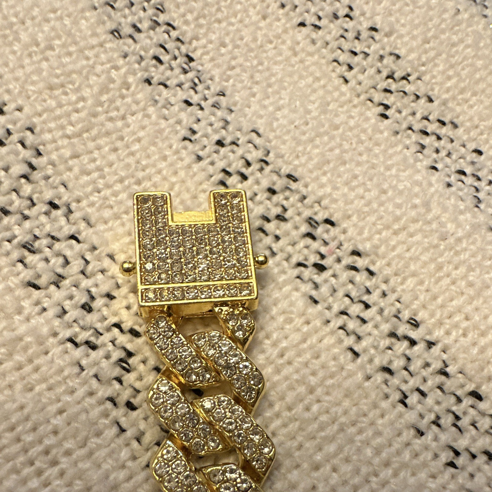 Gold Tone Cuban Link Chain Bracelet with Pavé Setting and Box Clasp Closure