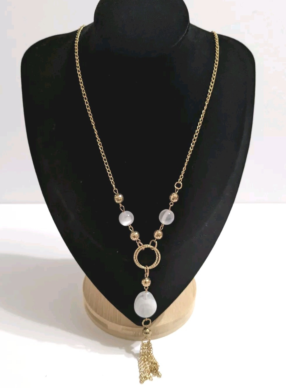 Gold Tone Y Drop Fashion Necklace With Tassel & Marbled White Acrylic Beads. 25″
