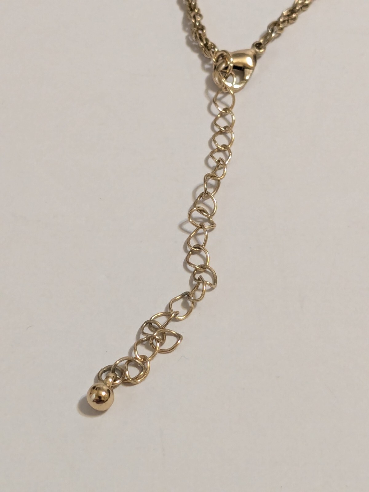 Peach Faux Shell Medallion Pendant Gold Tone Necklace. Metal Scroll Work. 30″.