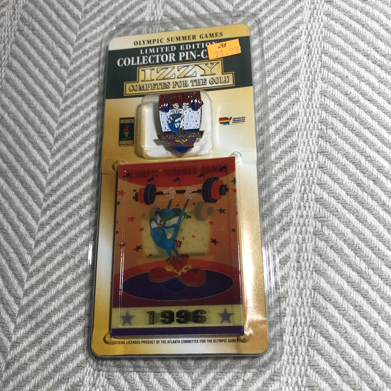 New NIP vintage 1996 commemorative Olympics pin mascot izzy weight lifting