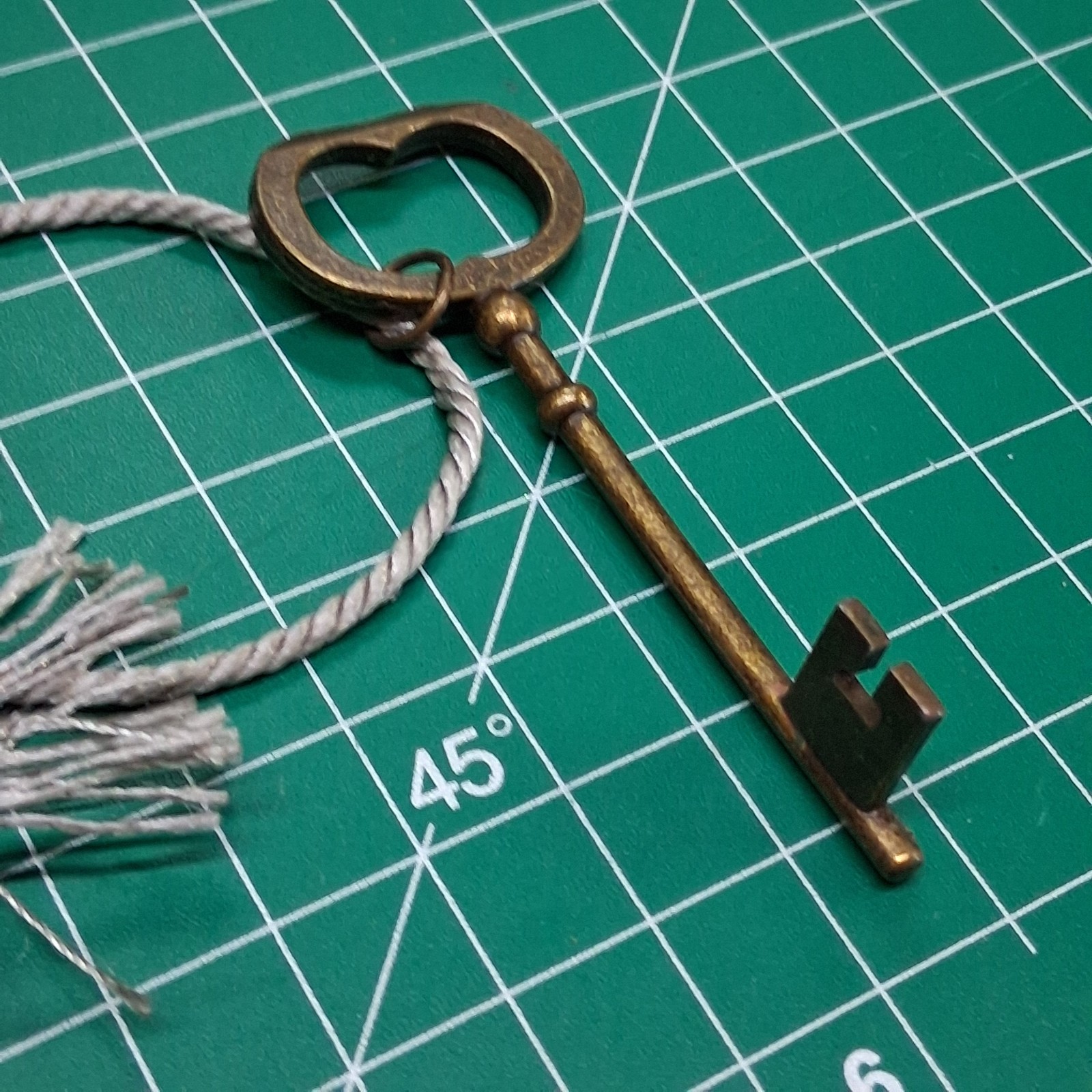 Vintage Dark Brass 3.25” Skeleton Key & Gray Tassle