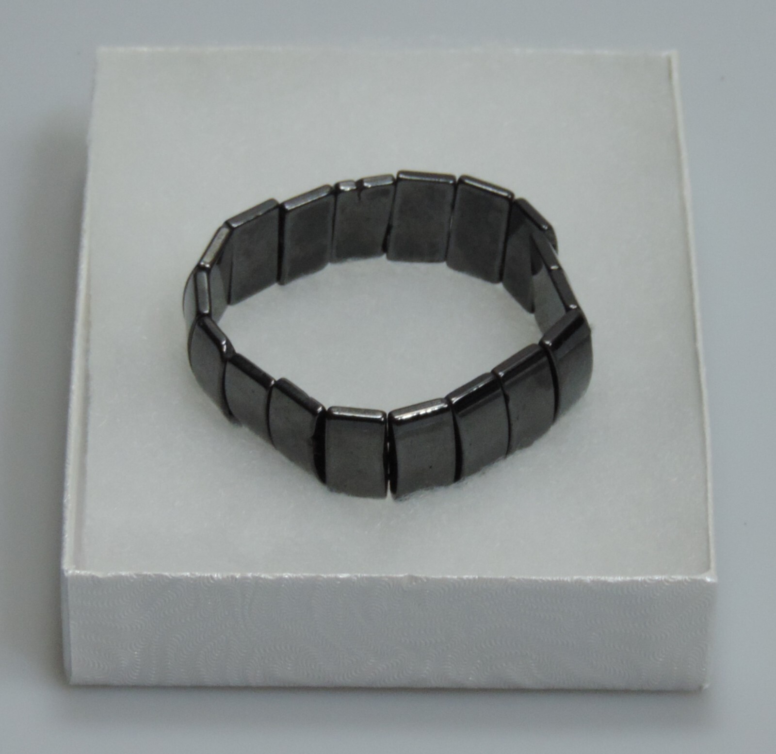 Bracelet, Stretch, Hemalyke (man-made) 18x10mm domed rectangle, 7 1/2″