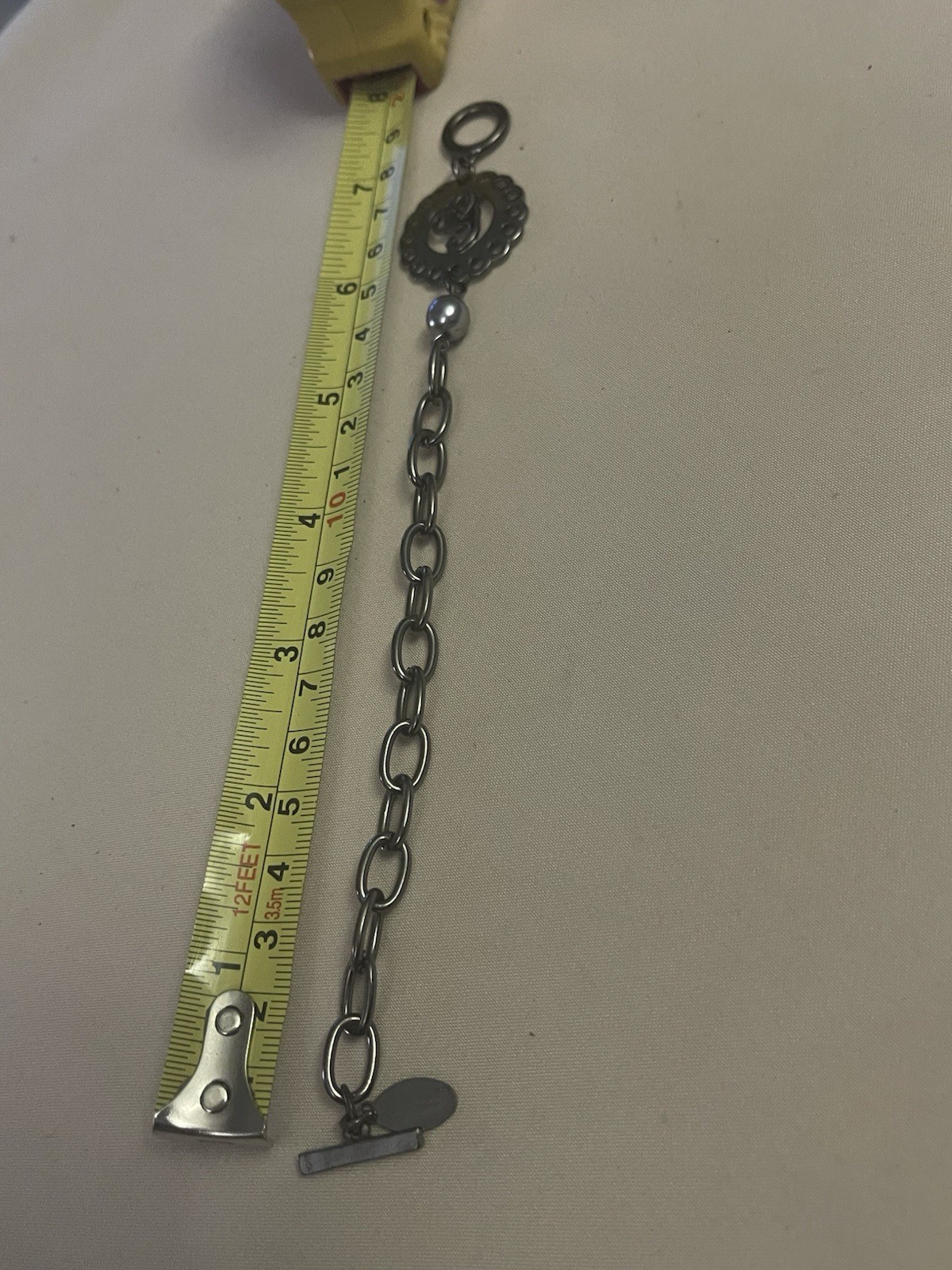 Guess Signed Silver Tone Oval Link Chain Charm Toggle Bracelet 7in