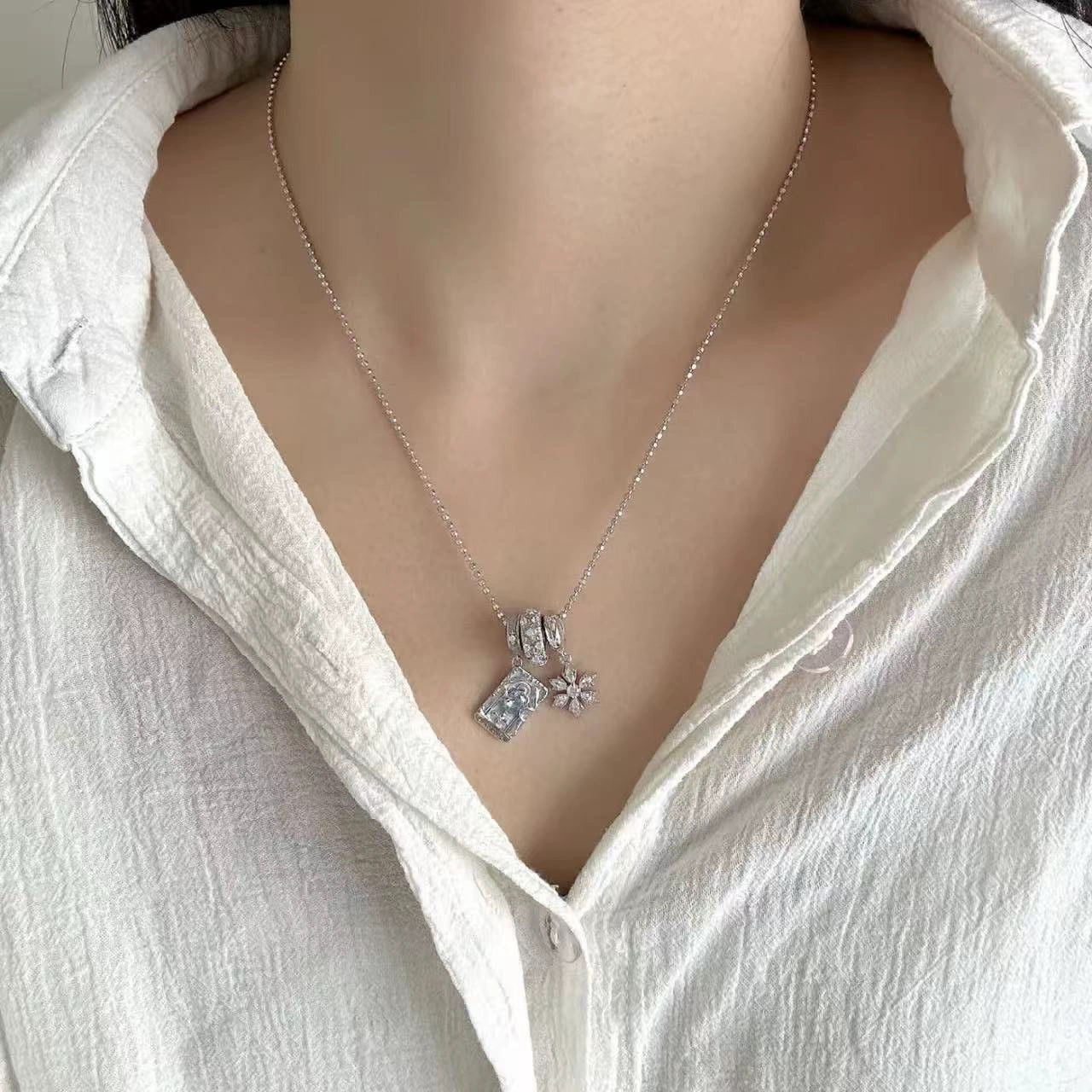 Silver Winter Snowflake Blue Cubic‑Zirconia Charm Necklace