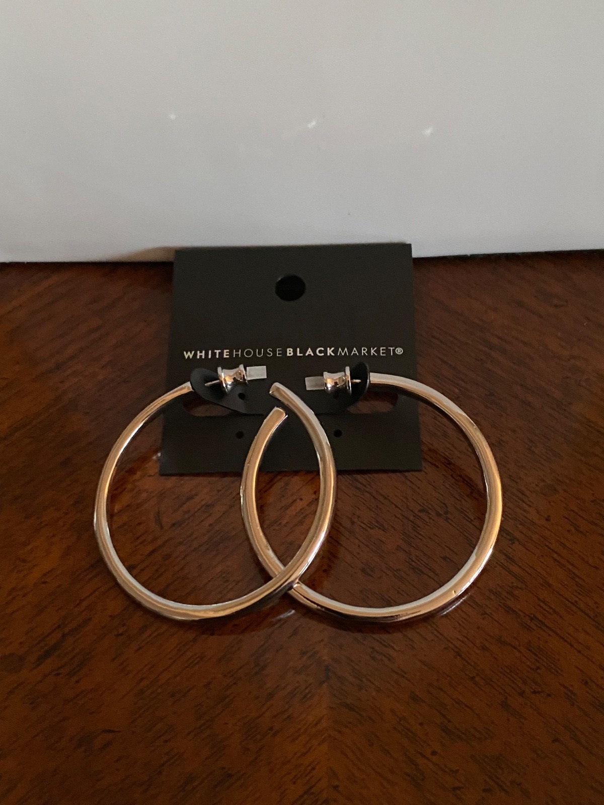 White House Black Market (WHBM) silver hoop earrings – NEW WITH TAGS (NWT)