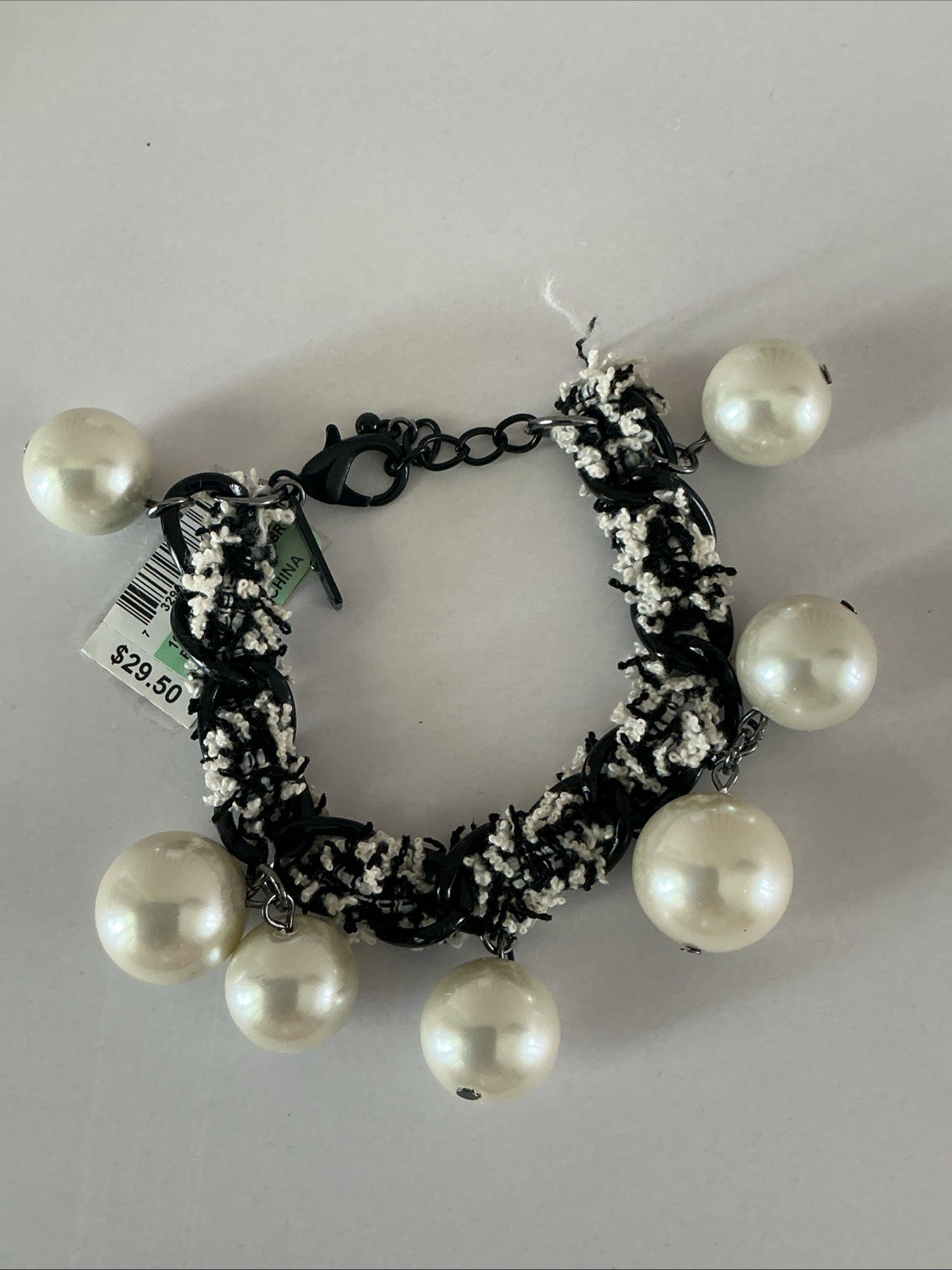 .I.N.C. International Concepts bracelet features black and white fabric
