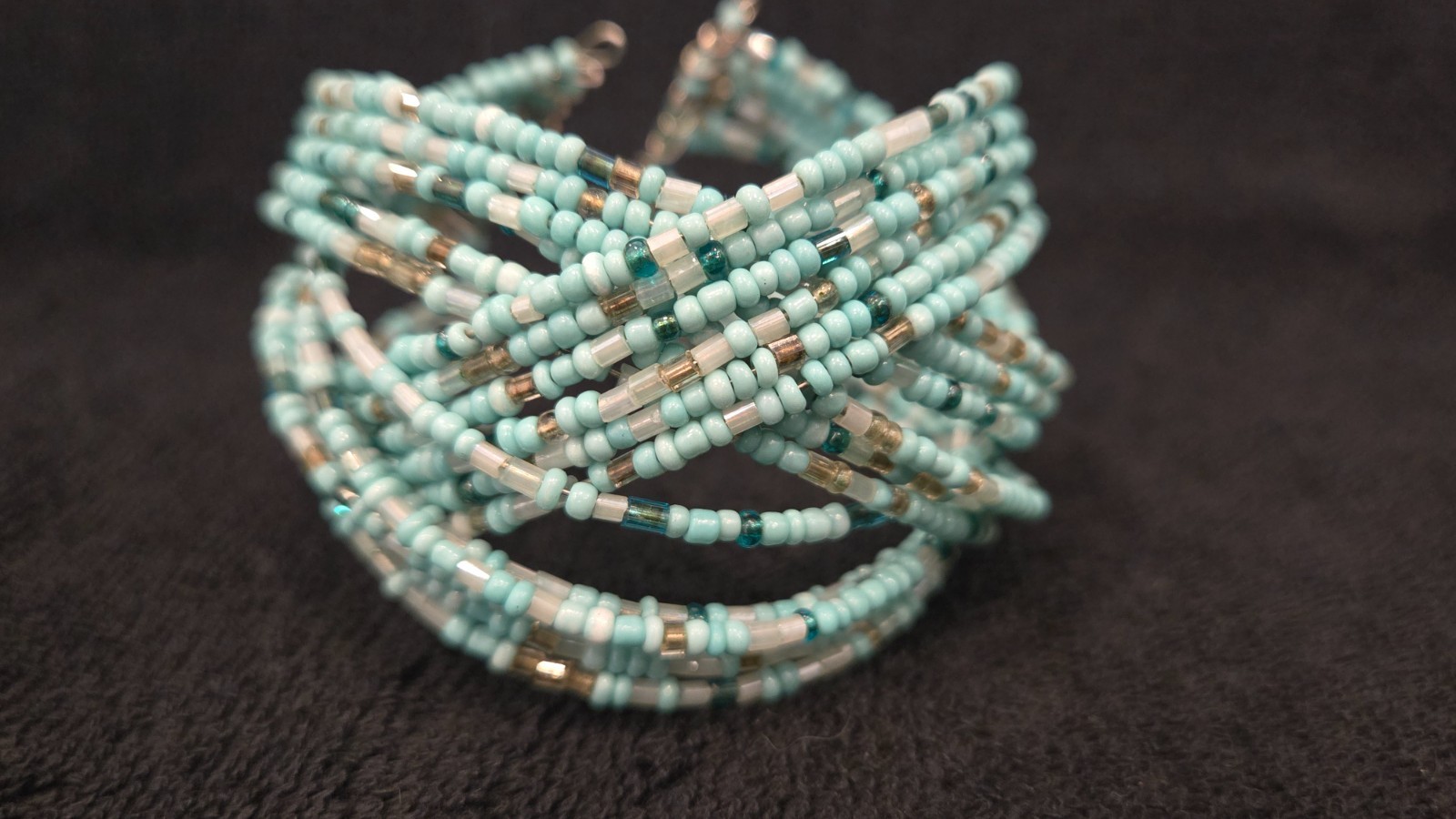 Sky Aqua beaded stretchable, good condition