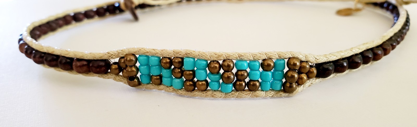 Lotus & Luna 21 inch string & bead necklace. Brown with turquoise accent beads.